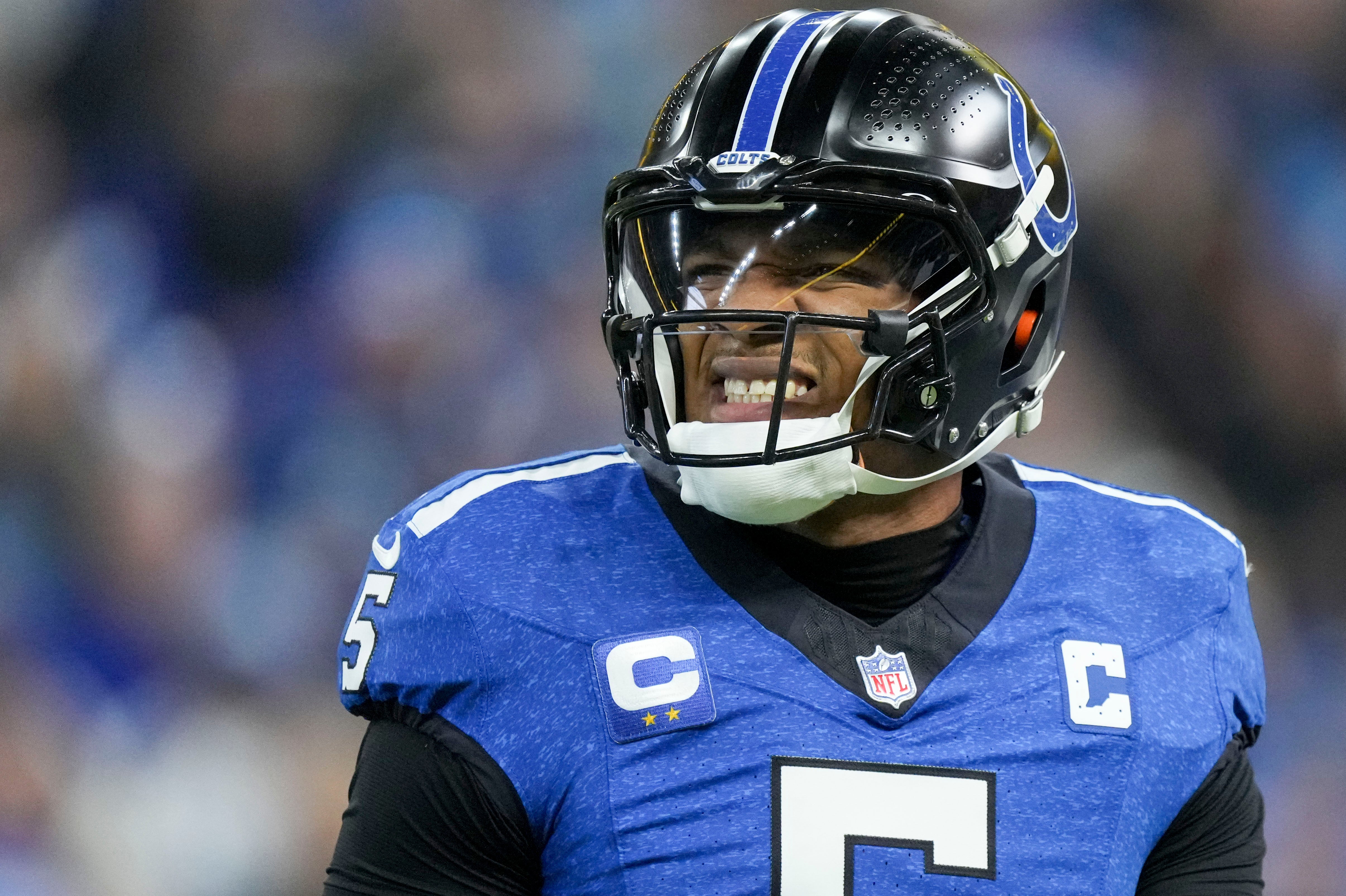 Nov 24, 2024; Indianapolis, Indiana, USA; Indianapolis Colts quarterback Anthony Richardson (5) reacts during a game against the Detroit Lions at Lucas Oil Stadium.