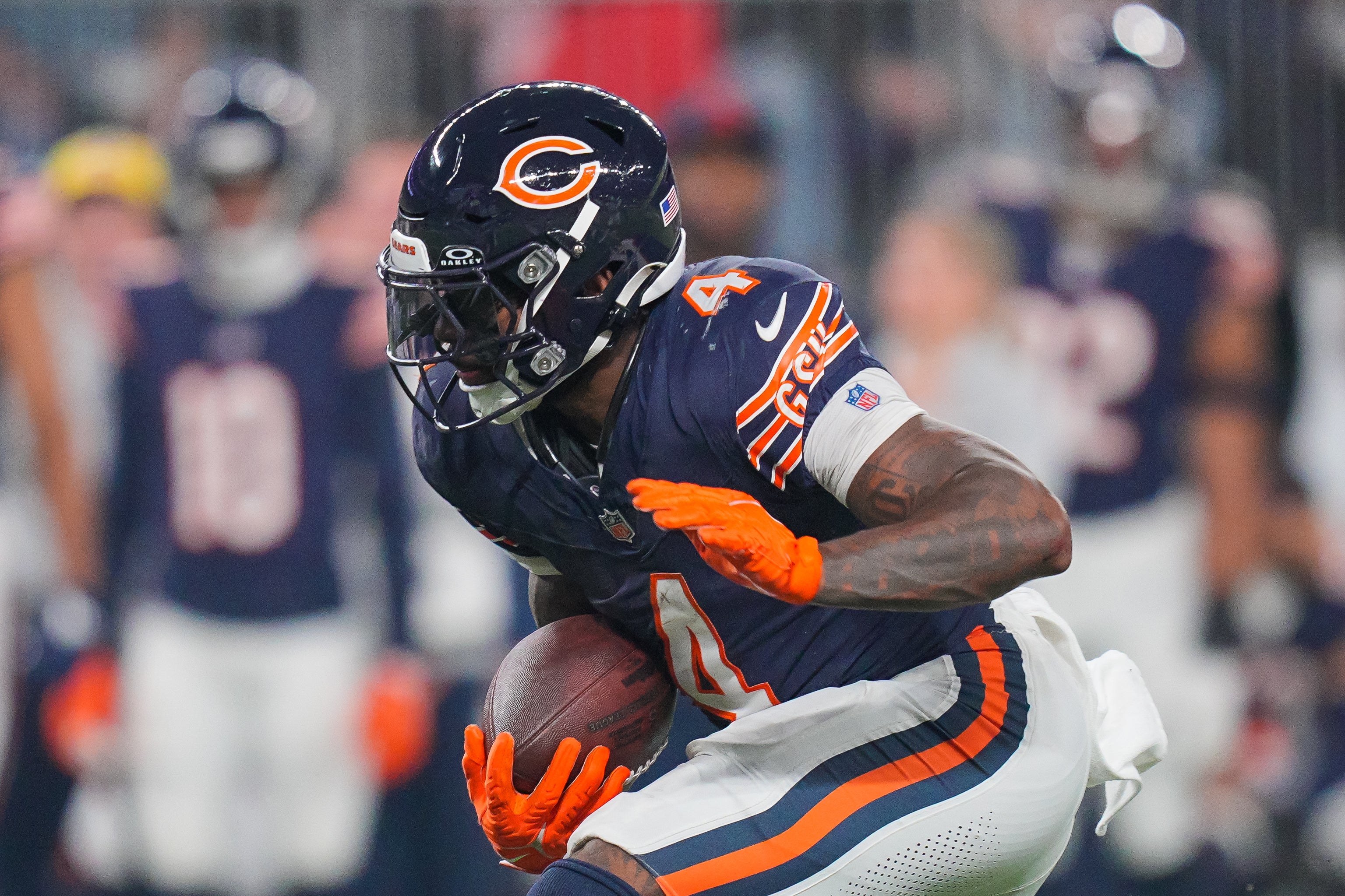 Dec 16, 2024; Minneapolis, Minnesota, USA; Chicago Bears running back D'Andre Swift (4) runs with the ball against the Minnesota Vikings in the fourth quarter at U.S. Bank Stadium.