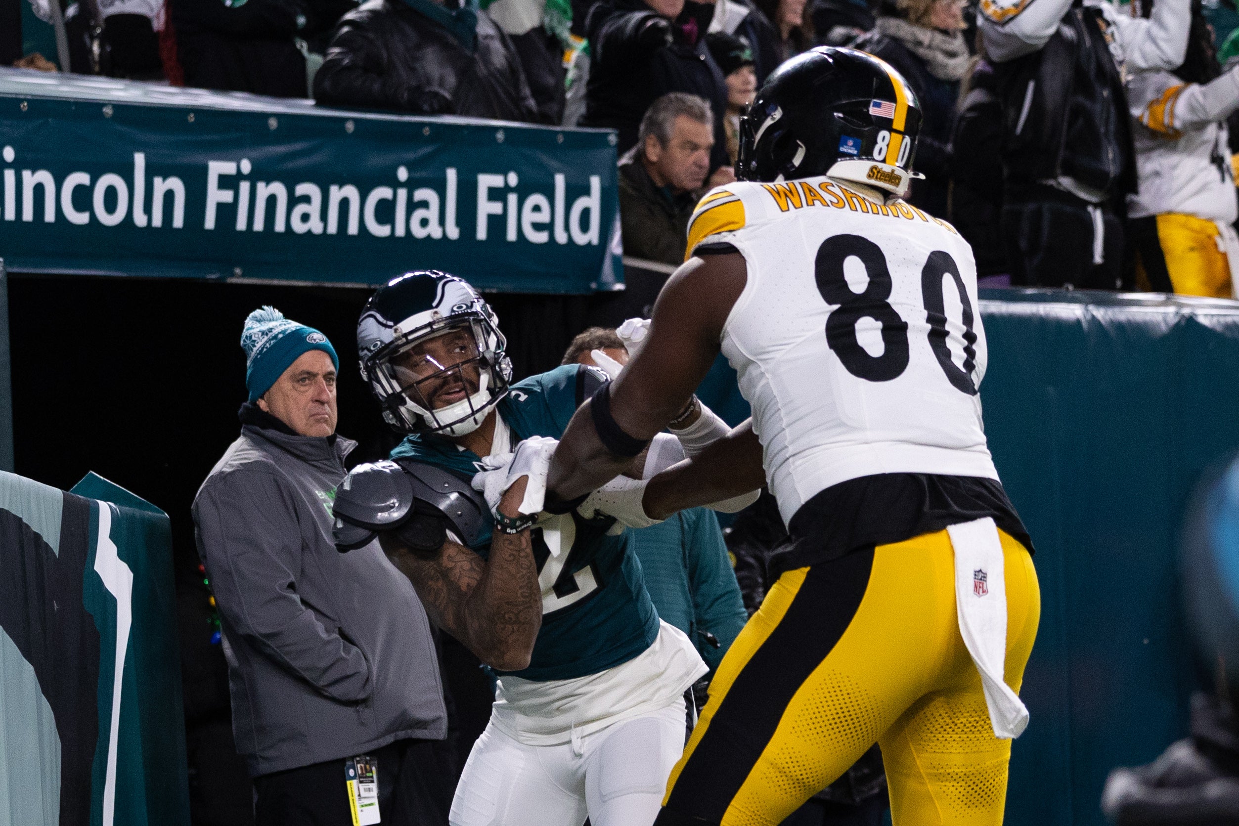 Philadelphia Eagles cornerback Darius Slay Jr. (2) and Pittsburgh Steelers tight end Darnell Washington (80) push and shove each other after a play during the first quarter at Lincoln Financial Field.