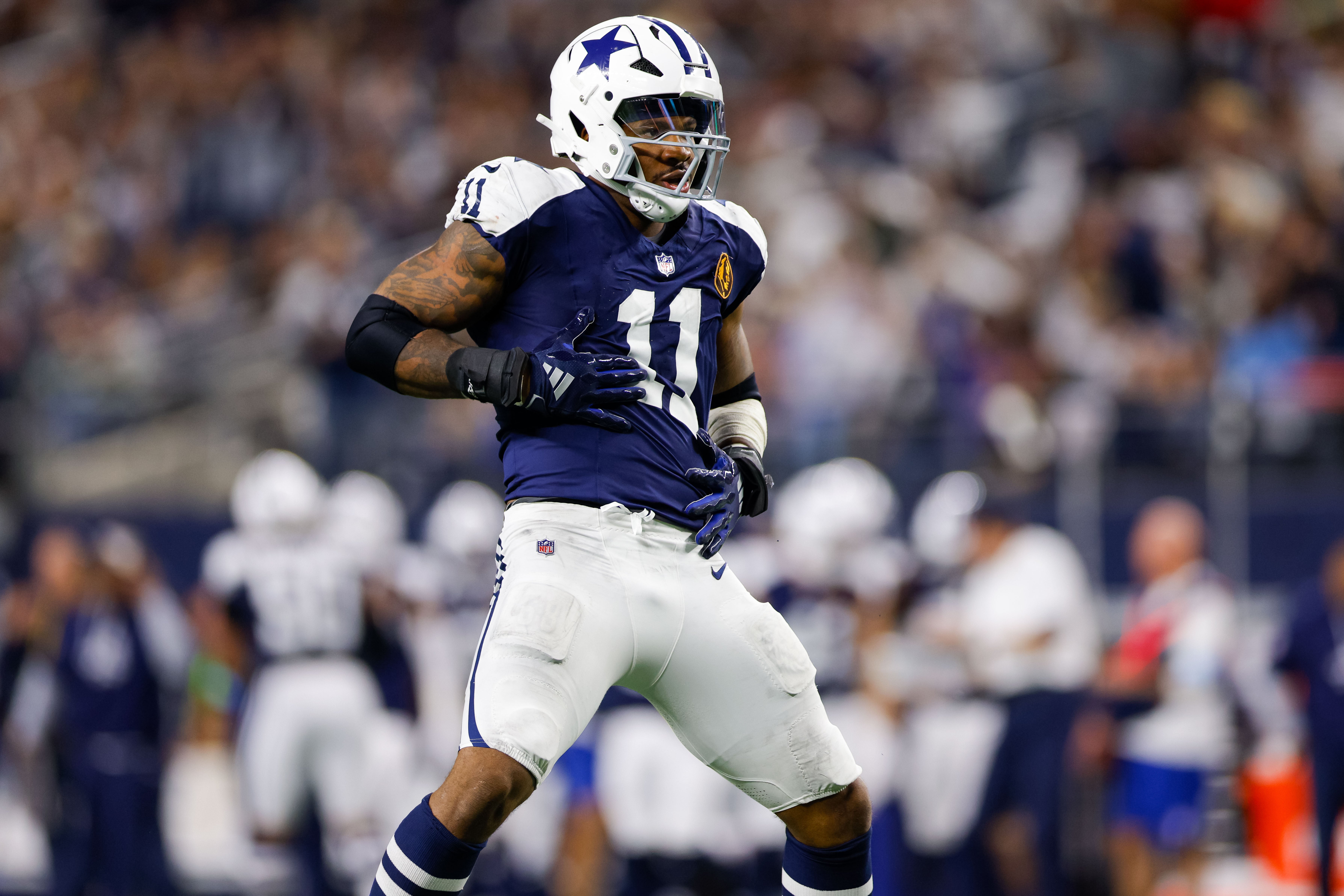 Dallas Cowboys linebacker Micah Parsons (11) celebrates after a sack during the third quarter against the New York Giants at AT&T Stadium.