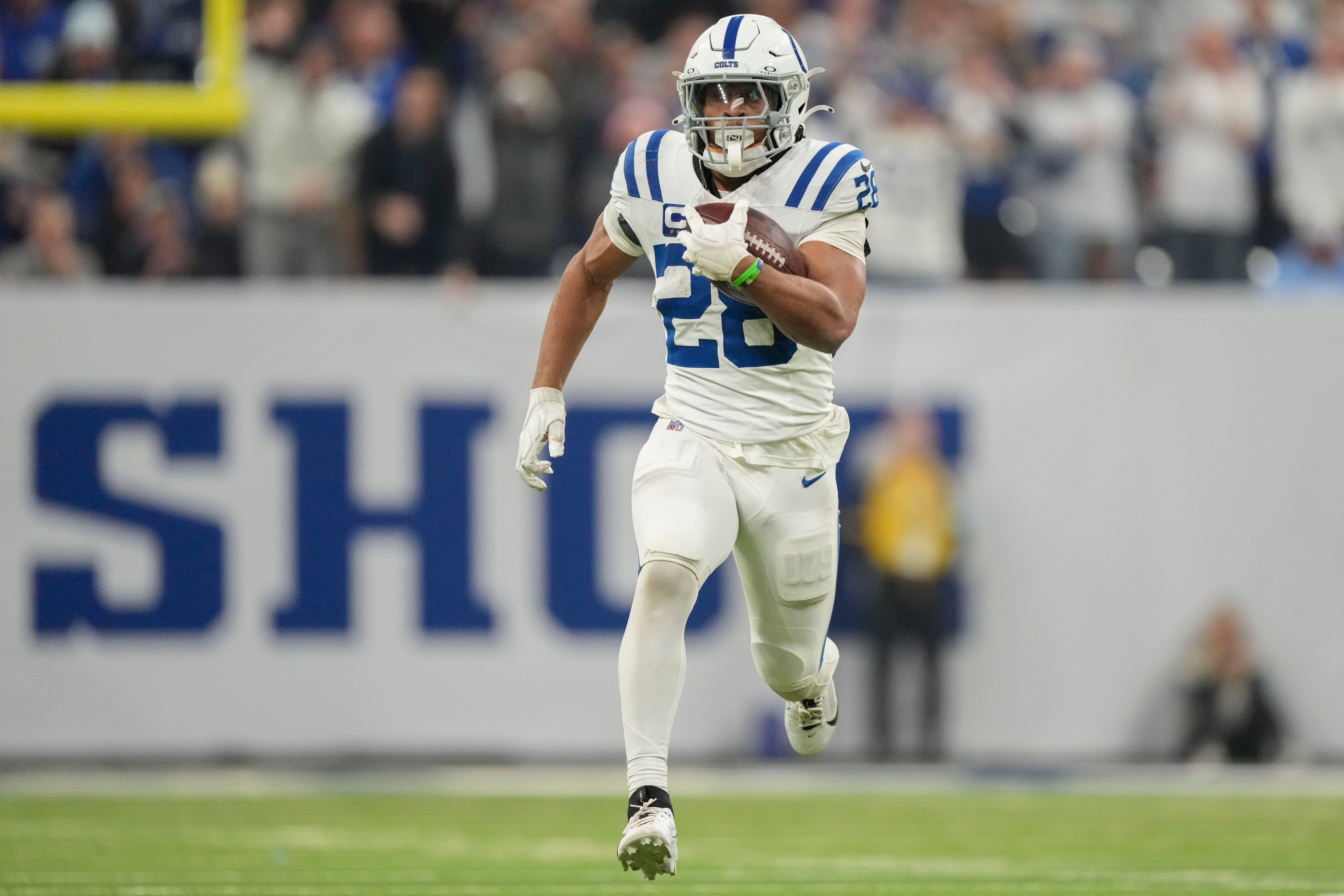Indianapolis Colts running back Jonathan Taylor (28) rushes for a touchdown Sunday, Dec. 22, 2024, during a game against the Tennessee Titans at Lucas Oil Stadium in Indianapolis.