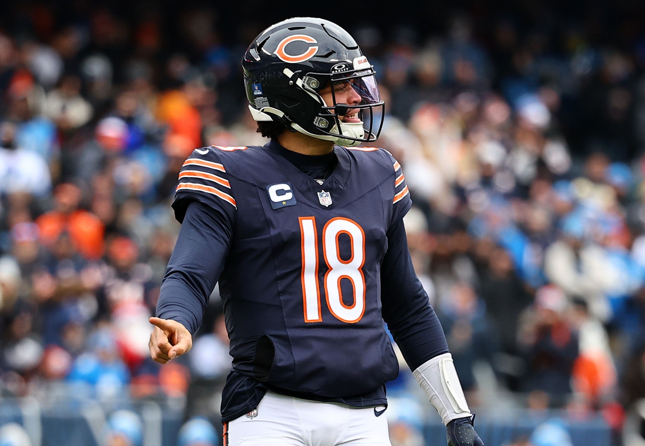 Dec 22, 2024; Chicago, Illinois, USA; Chicago Bears quarterback Caleb Williams (18) reacts against the Detroit Lions during the second quarter at Soldier Field.