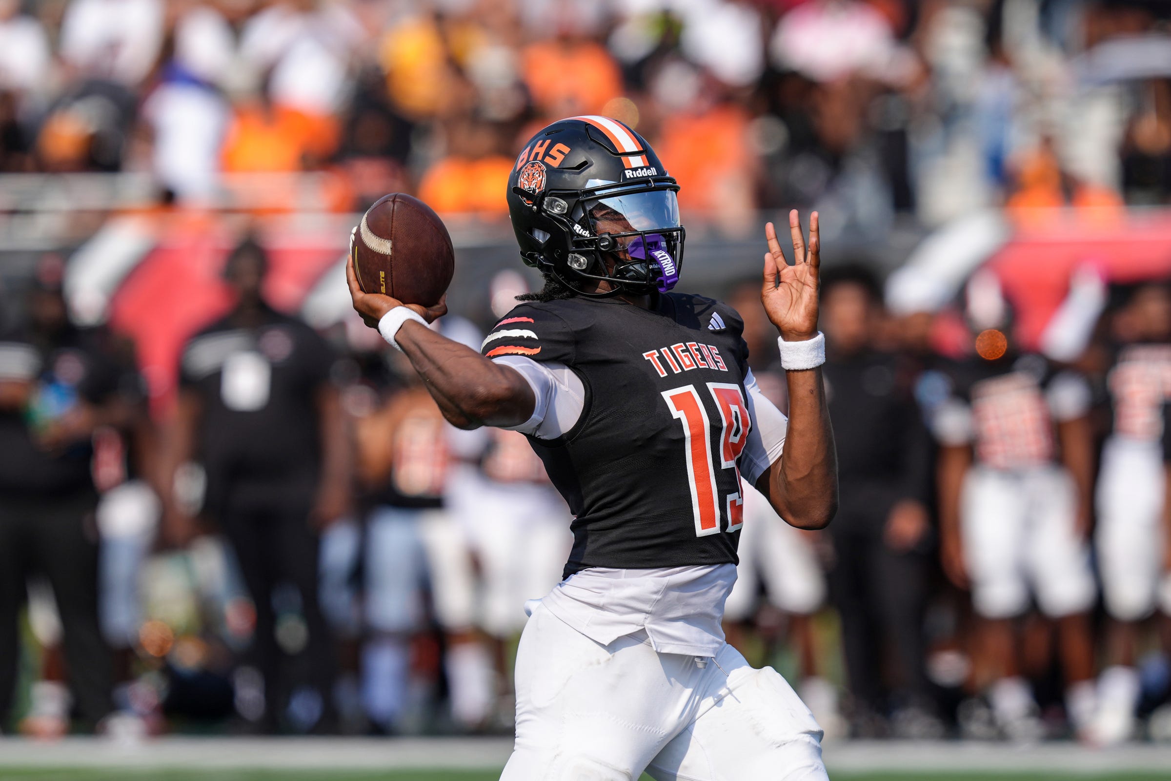 Belleville QB Bryce Underwood throws a pass against Clarkston during the 2024 Xenith Prep Kickoff Classic at Wayne State's Tom Adams Field in Detroit on Friday, Aug. 30, 2024.