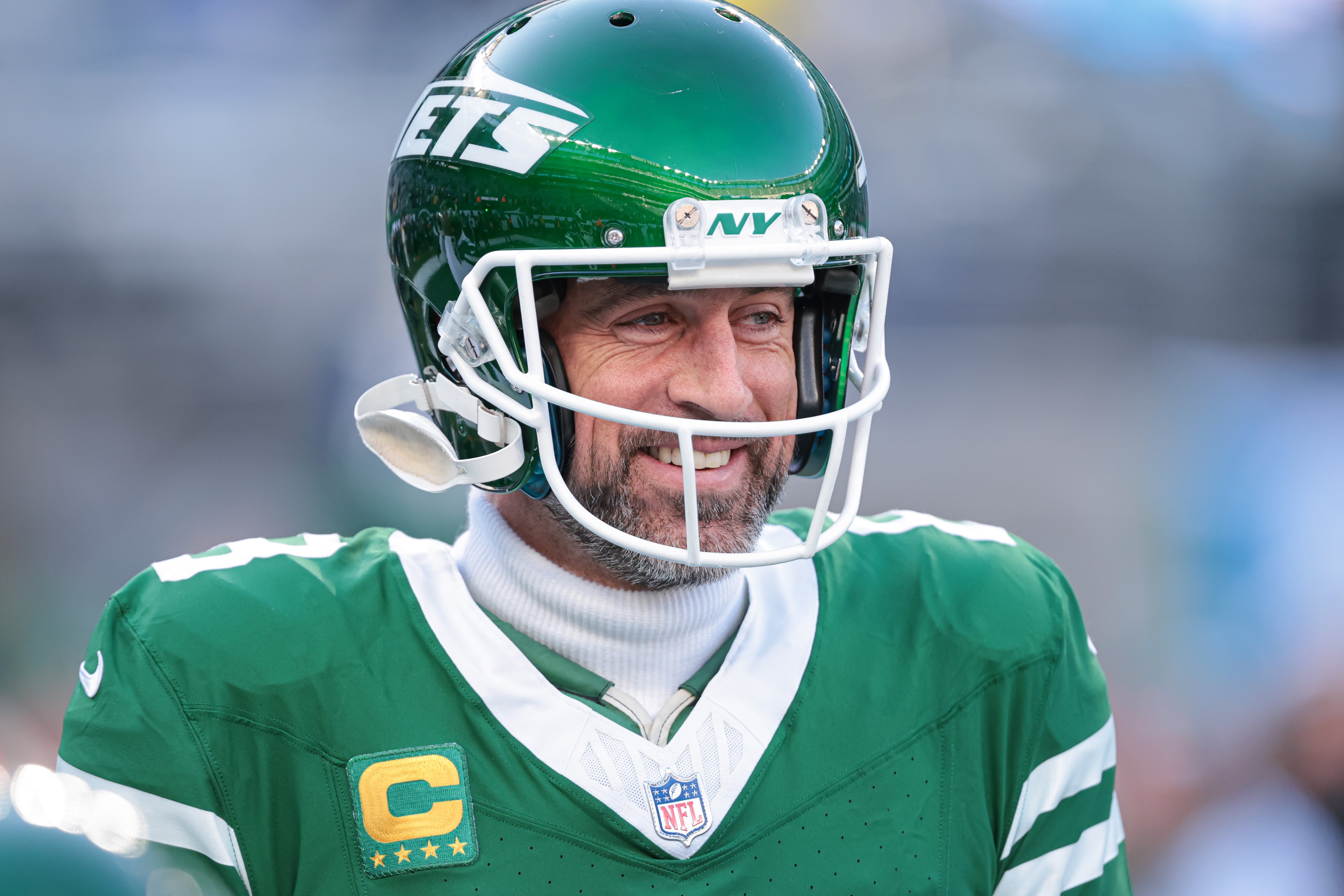 New York Jets quarterback Aaron Rodgers (8) looks on before the game against the Los Angeles Rams at MetLife Stadium.