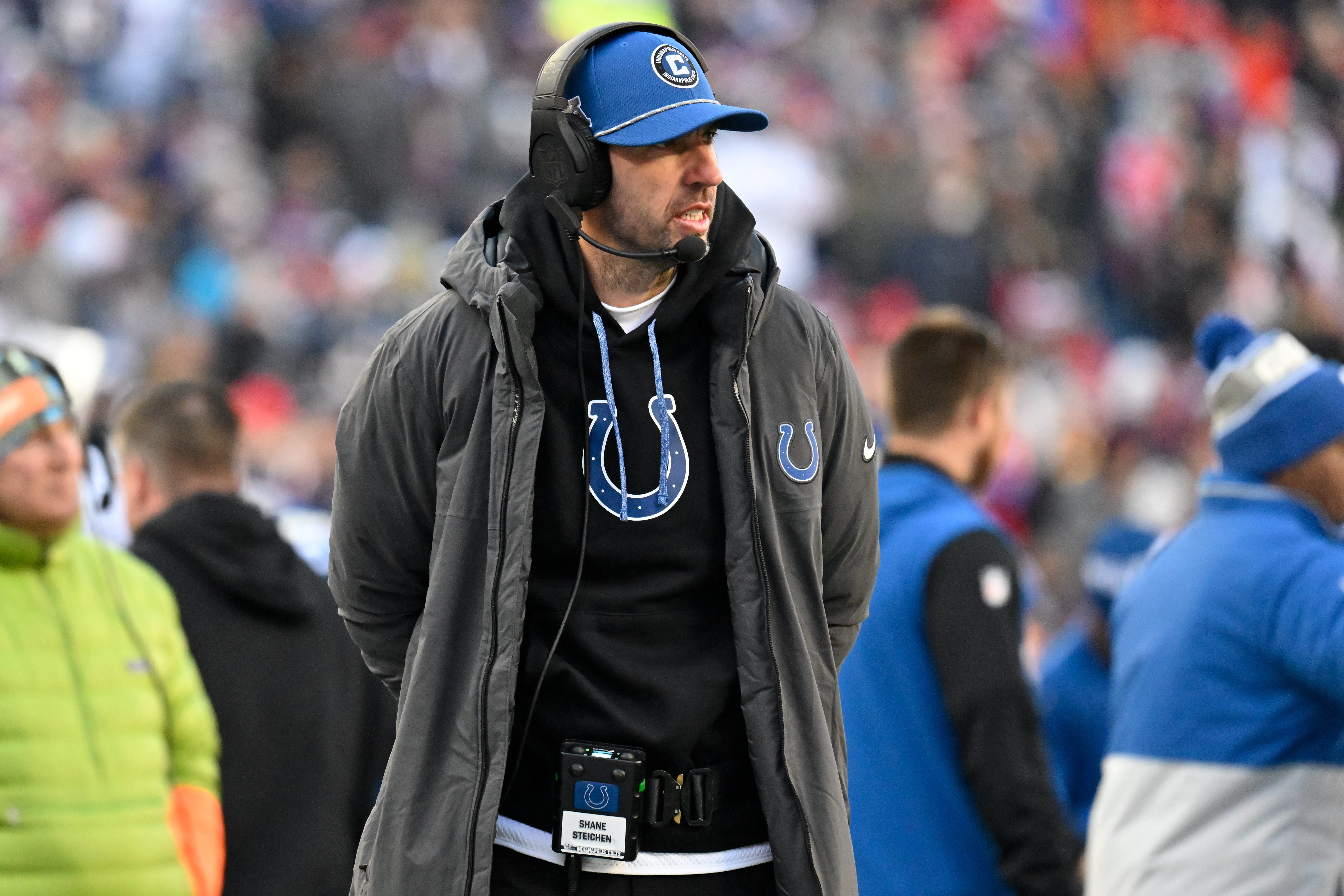 Dec 1, 2024; Foxborough, Massachusetts, USA; Indianapolis Colts head coach Shane Steichen works from the sideline during the first half against the Indianapolis Colts at Gillette Stadium.