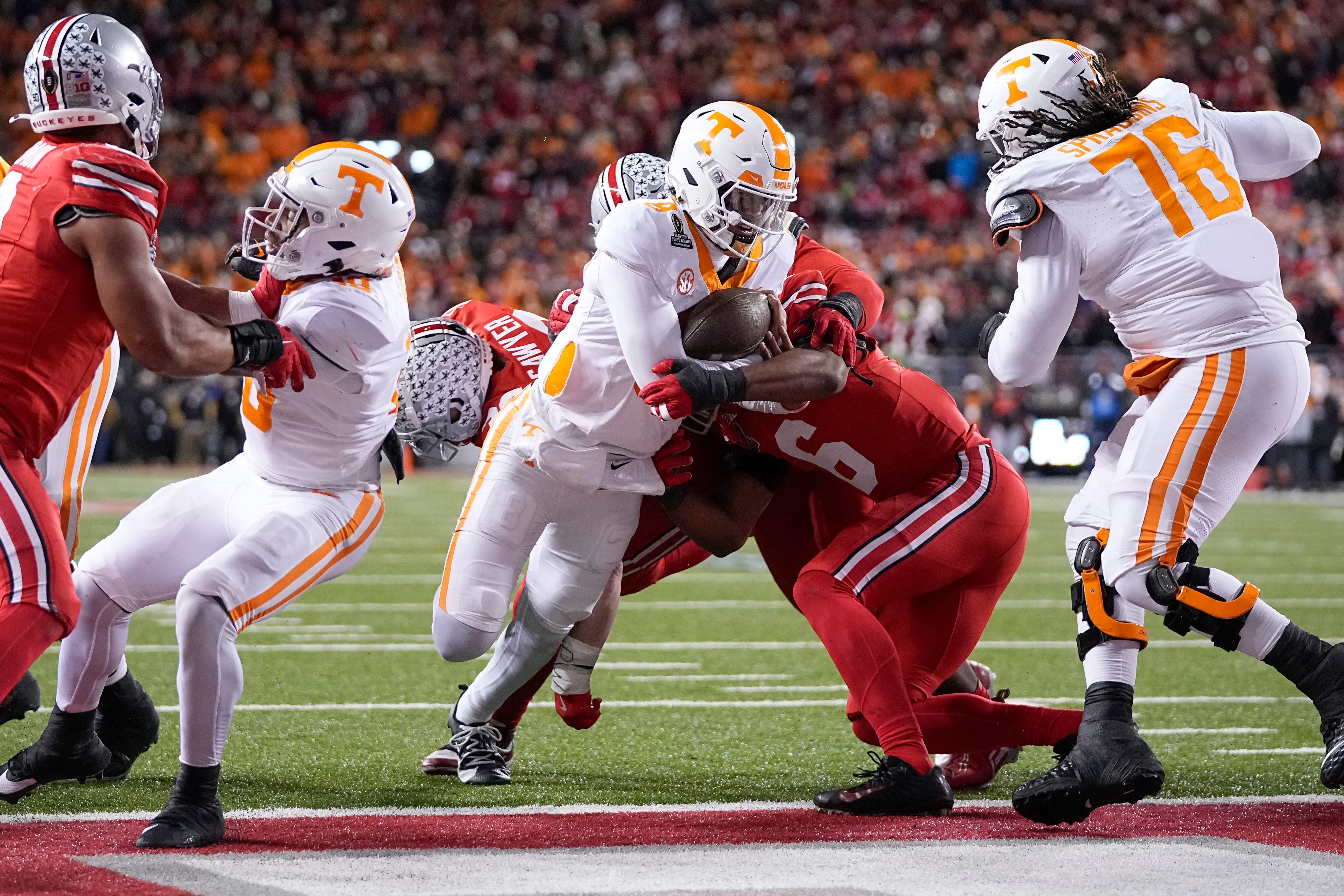 Tennessee Volunteers quarterback Nico Iamaleava (8) runs for a touchdown during the first half of the College Football Playoff first round game against the Ohio State Buckeyes at Ohio Stadium in Columbus on Dec. 21, 2024.