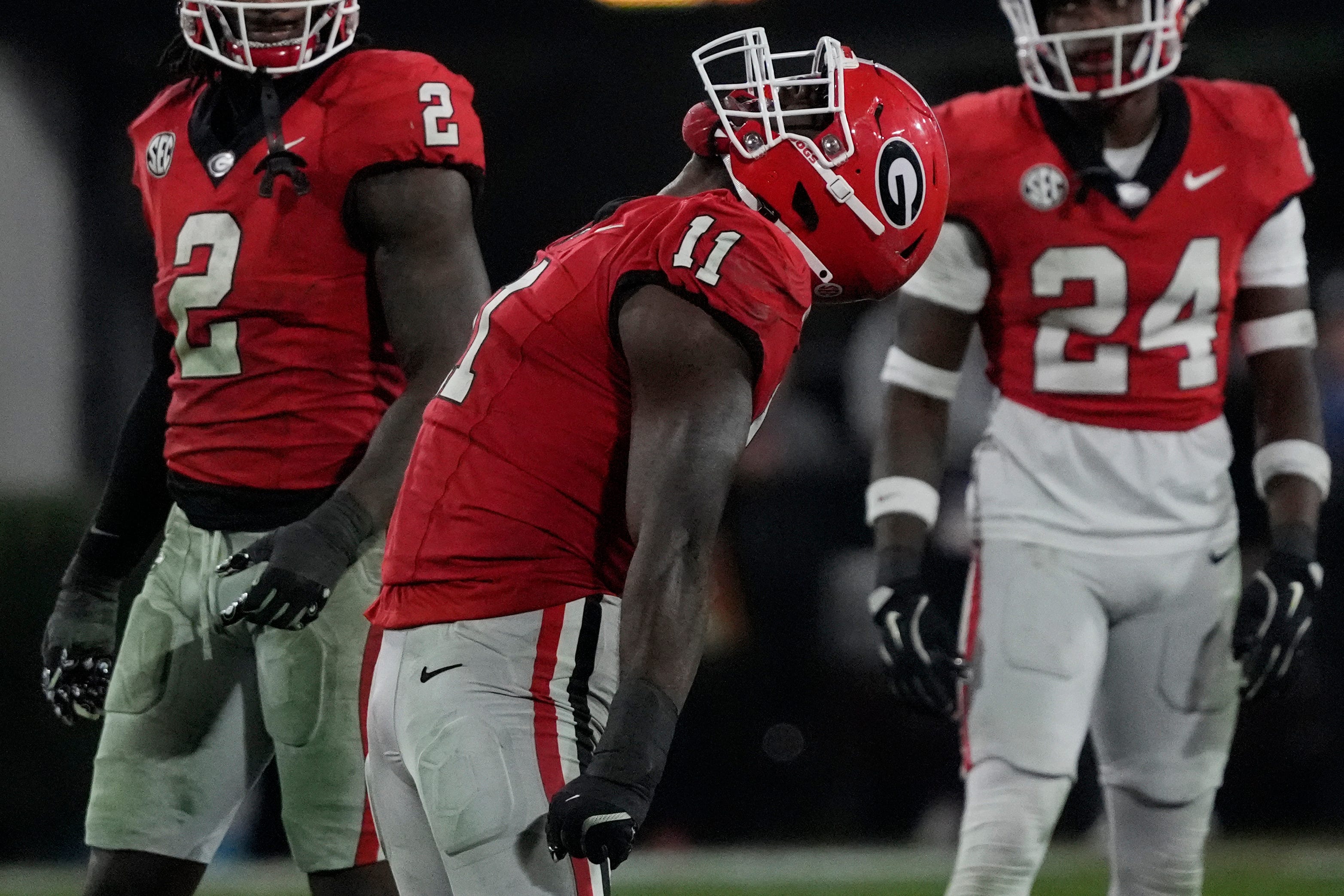 Georgia linebacker Jalon Walker (11) celebrates after sacking Tennessee quarterback Nico Iamaleava (8) during the second half of a NCAA college football game against Tennessee in Athens, Ga., on Saturday.