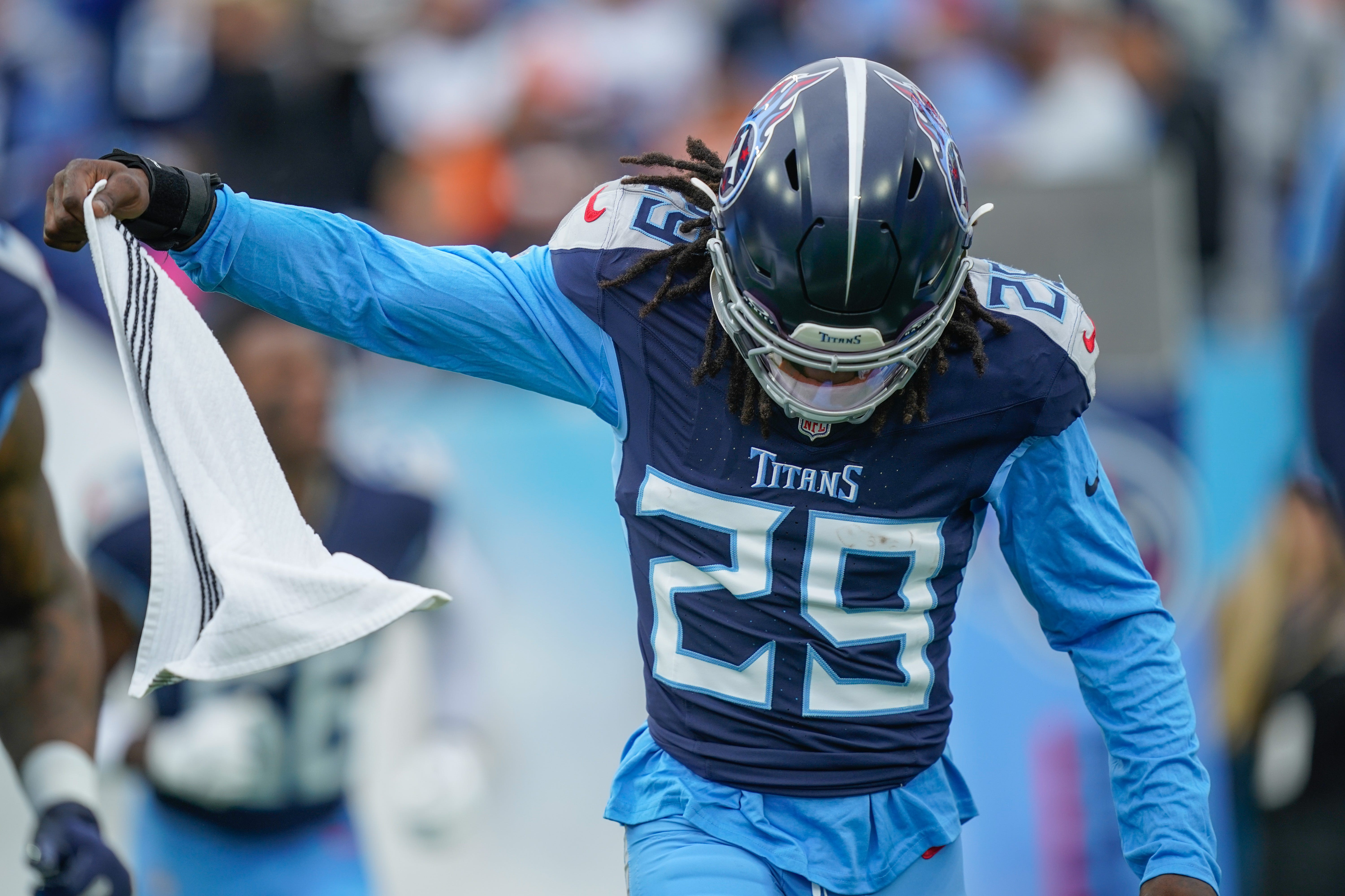 Tennessee Titans cornerback Jarvis Brownlee Jr. (29) hits the field before the Titans play the Bengals at Nissan Stadium in Nashville, Tenn., Sunday, Dec. 15, 2024.