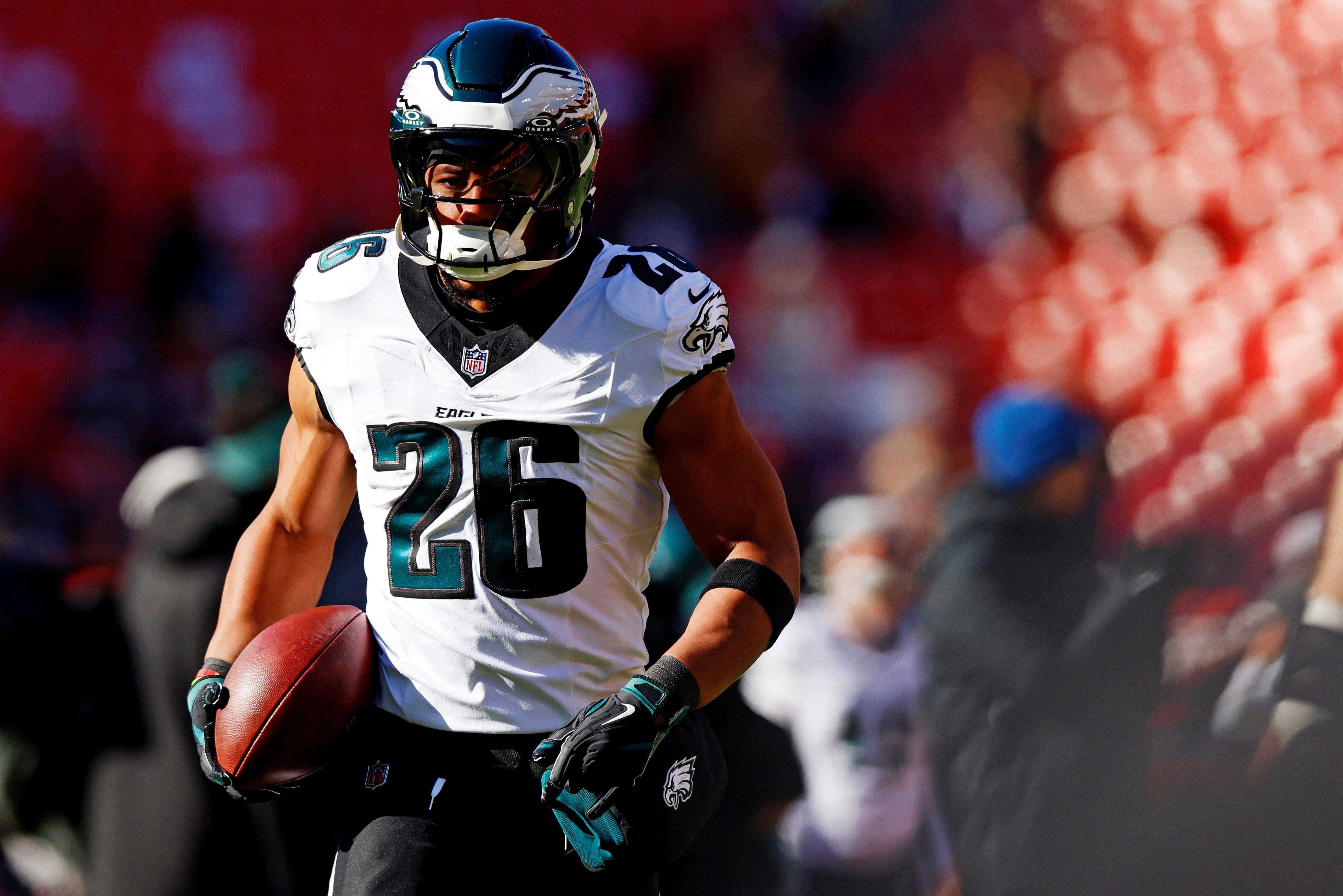 Philadelphia Eagles running back Saquon Barkley (26) warms up before playing against the Washington Commanders at Northwest Stadium.
