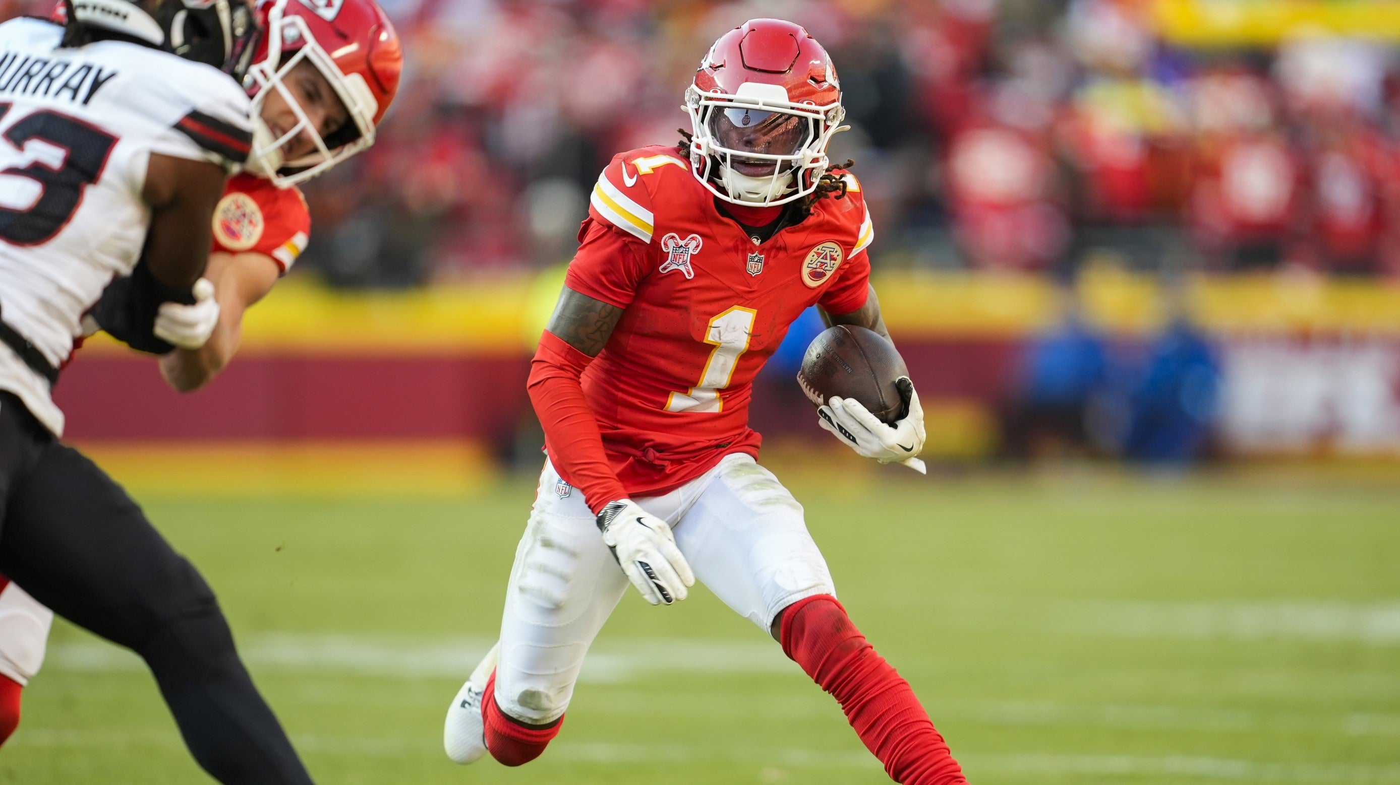 Dec 21, 2024; Kansas City, Missouri, USA; Kansas City Chiefs wide receiver Xavier Worthy (1) runs with the ball during the second half against the Kansas City Chiefs at GEHA Field at Arrowhead Stadium.