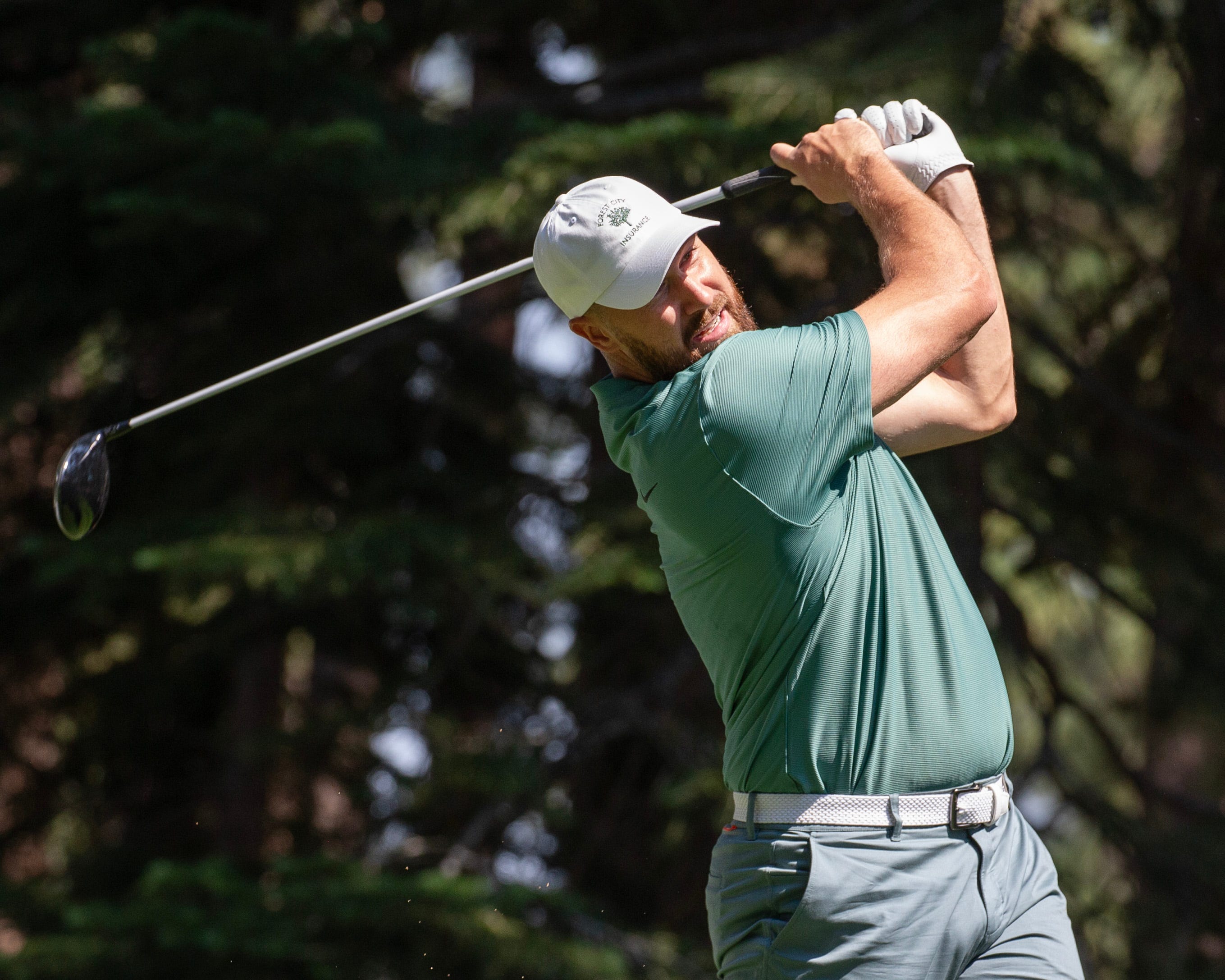 Travis Kelce watches his a tee shot on the 4 hole during the first round of the American Century Celebrity Championship golf tournament at Edgewood Tahoe Golf Course in Stateline, Nev., Friday, July 12, 2024.