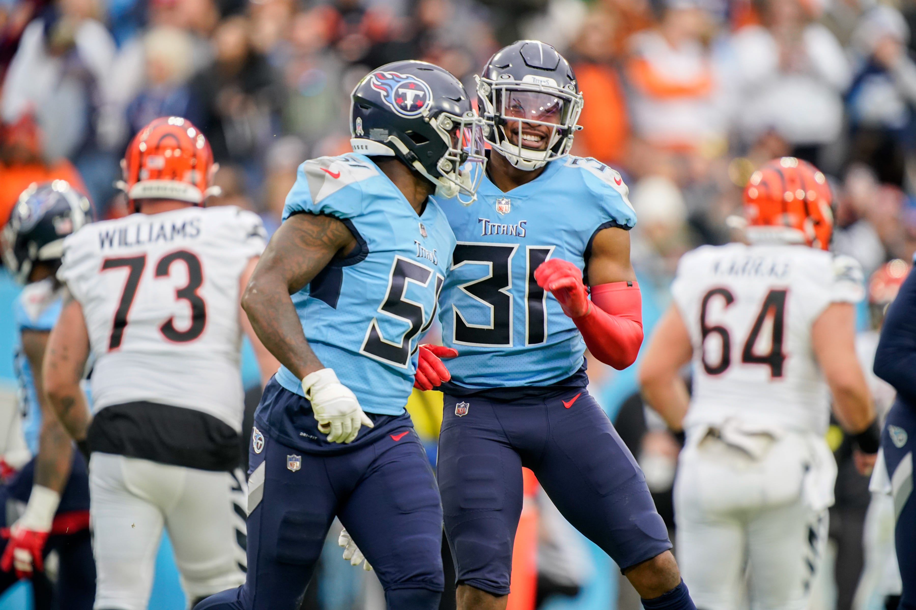 Tennessee Titans linebacker David Long Jr. (51) and safety Kevin Byard (31) celebrate a play as they face the Cincinnati Bengals during the first quarter at Nissan Stadium Sunday, Nov. 27, 2022, in Na... George Walker IV / Tennessean.com-USA TODAY NETWORK