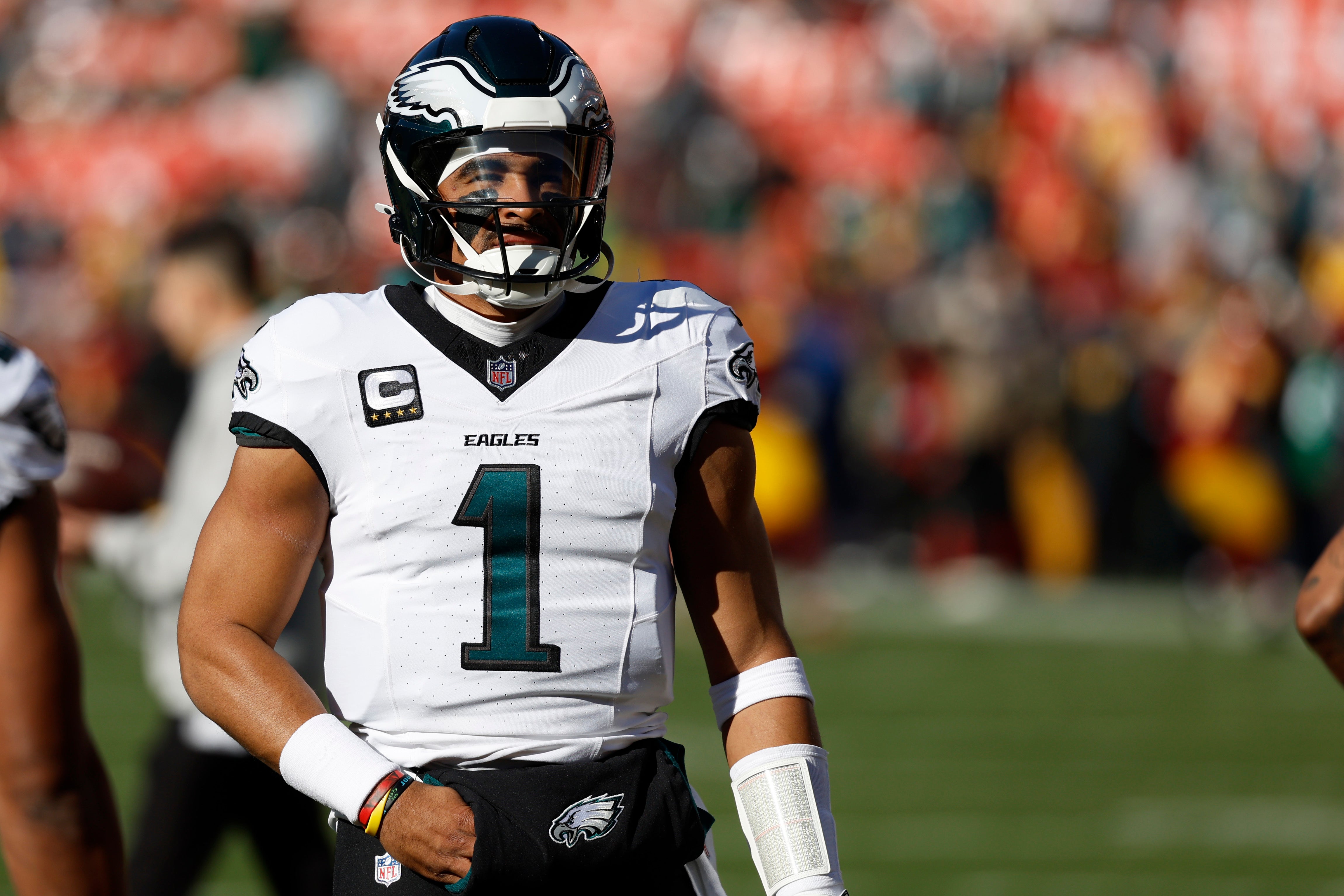 Philadelphia Eagles quarterback Jalen Hurts (1) stands on the field during warmup prior to the game against the Washington Commanders at Northwest Stadium.