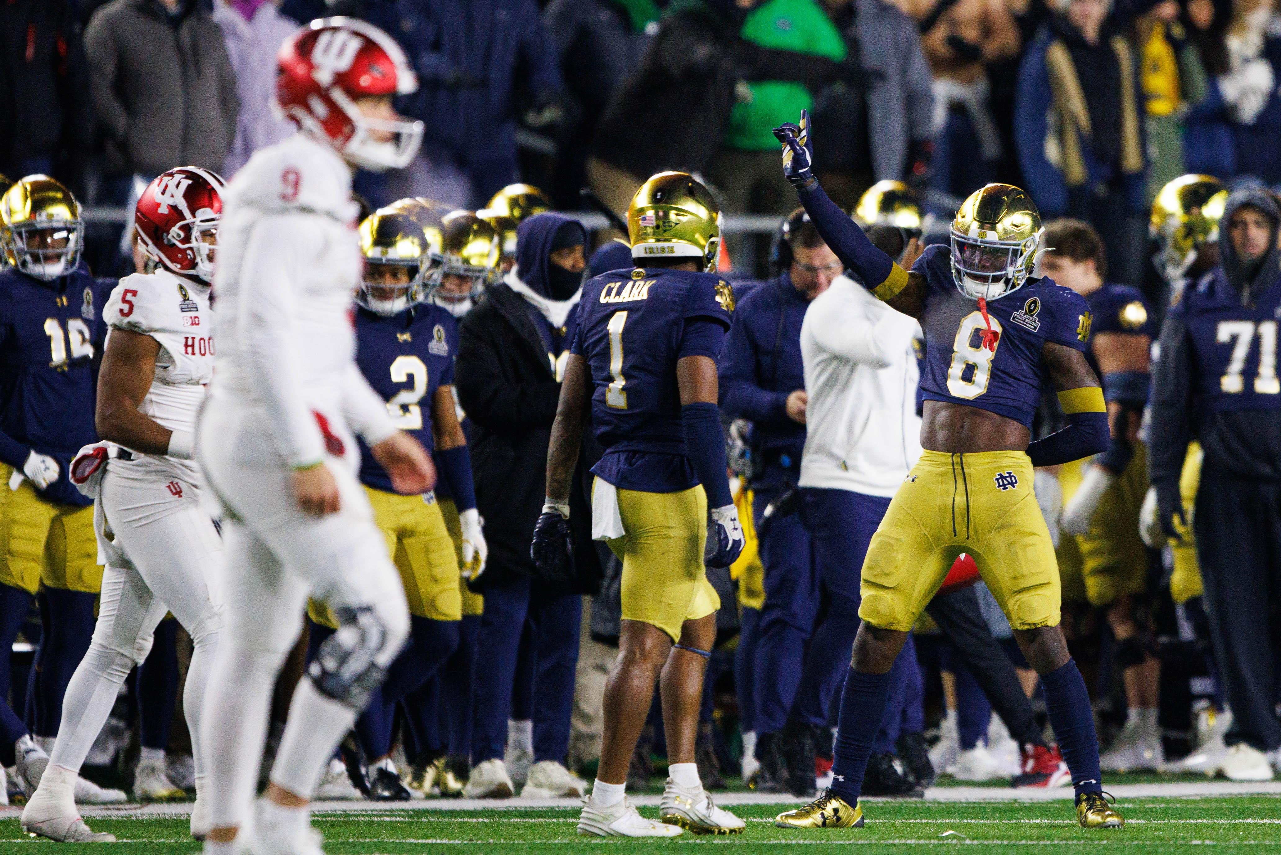 Notre Dame safety Adon Shuler (8) celebrates getting a stop during the first round of the College Football Playoff between Notre Dame and Indiana at Notre Dame Stadium on Friday, Dec. 20, 2024, in South Bend.