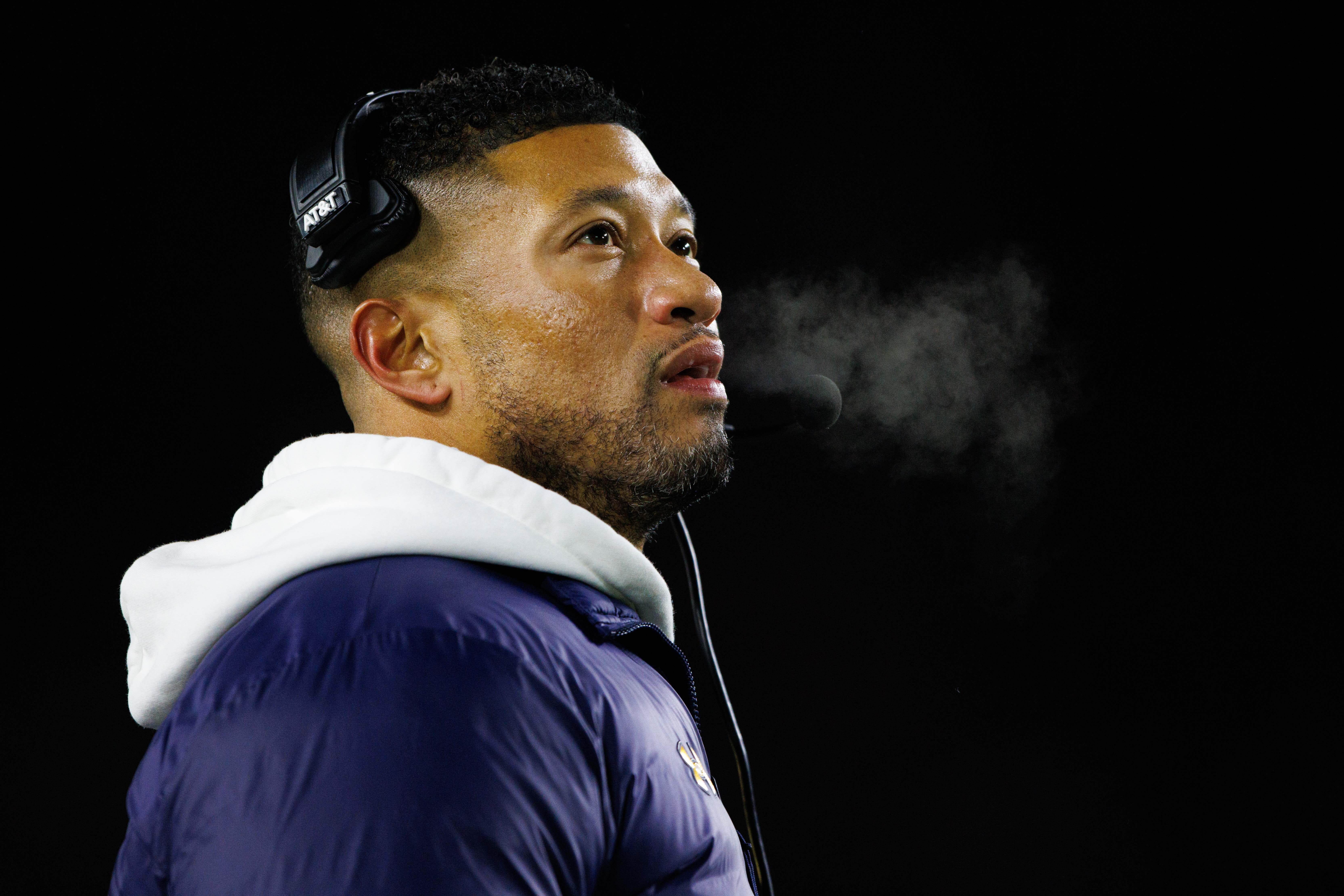 Notre Dame head coach Marcus Freeman looks up at the scoreboard during the first round of the College Football Playoff between Notre Dame and Indiana at Notre Dame Stadium on Friday, Dec. 20, 2024, in South Bend.