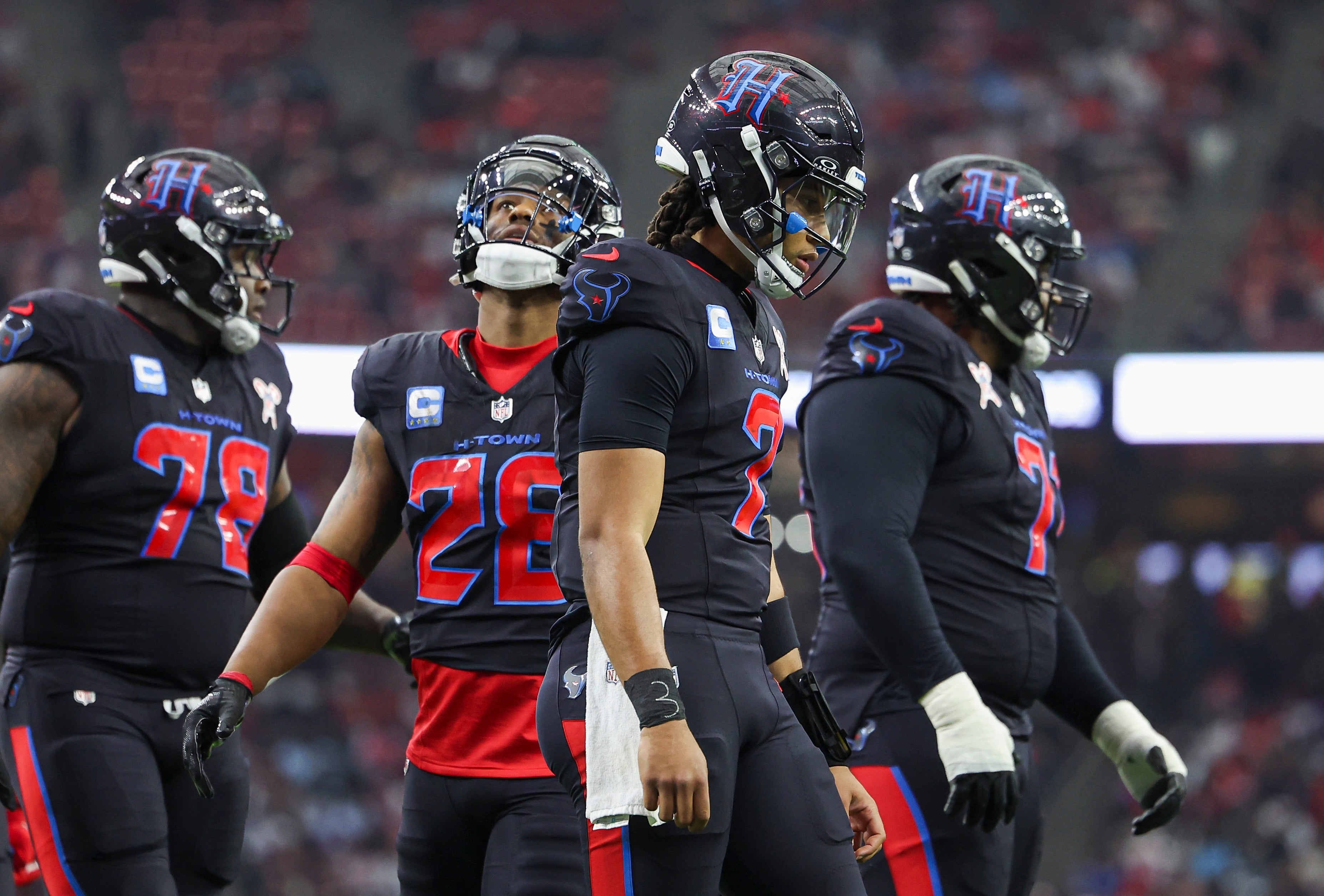 Dec 25, 2024; Houston, Texas, USA; Houston Texans quarterback C.J. Stroud (7) reacts after a play during the game against the Baltimore Ravens at NRG Stadium. Mandatory Credit: Troy Taormina-Imagn Images