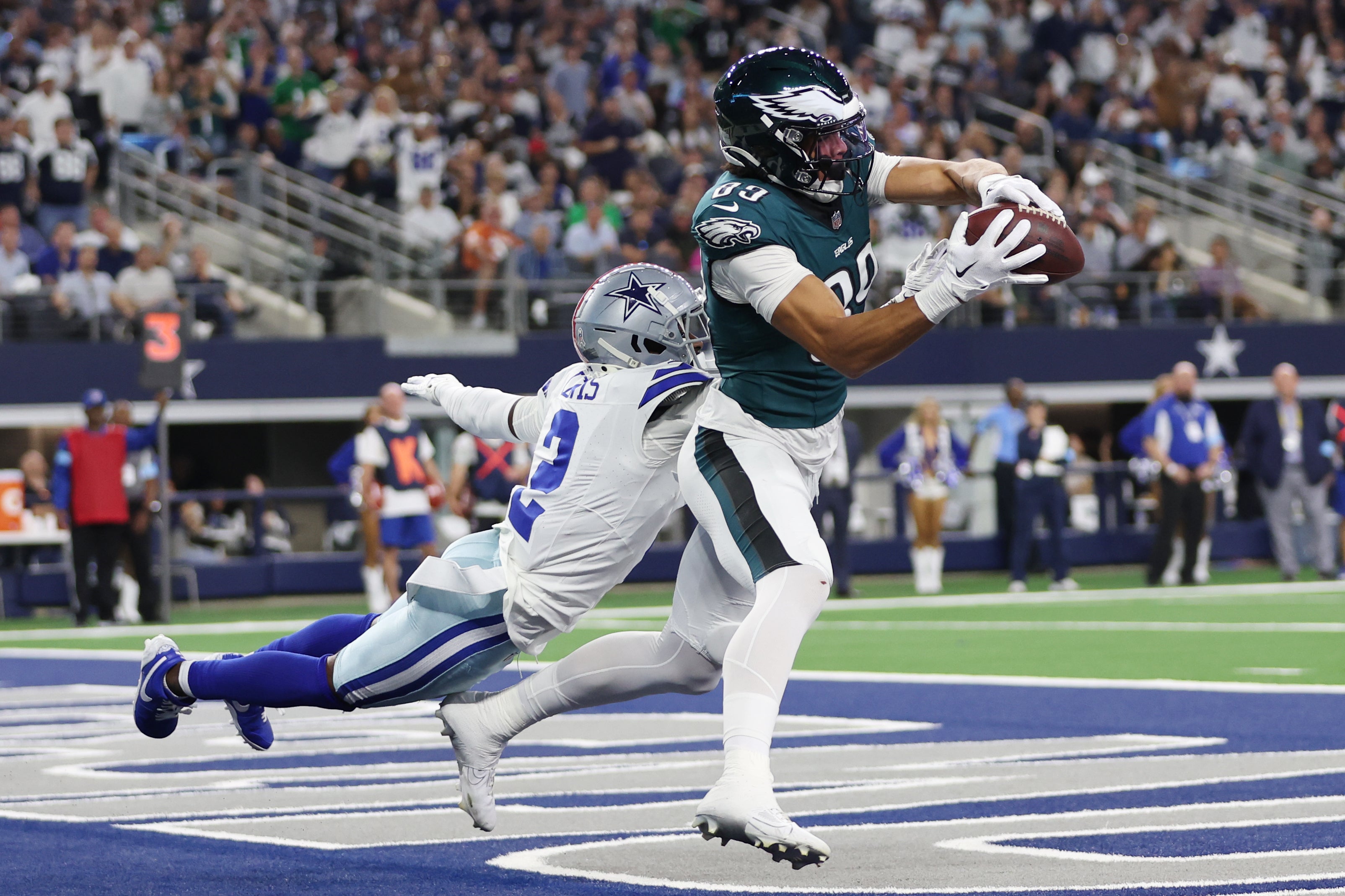 Philadelphia Eagles wide receiver Jahan Dotson (83) catches a touchdown pass against Dallas Cowboys cornerback Jourdan Lewis (2) in the third quarter at AT&T Stadium.