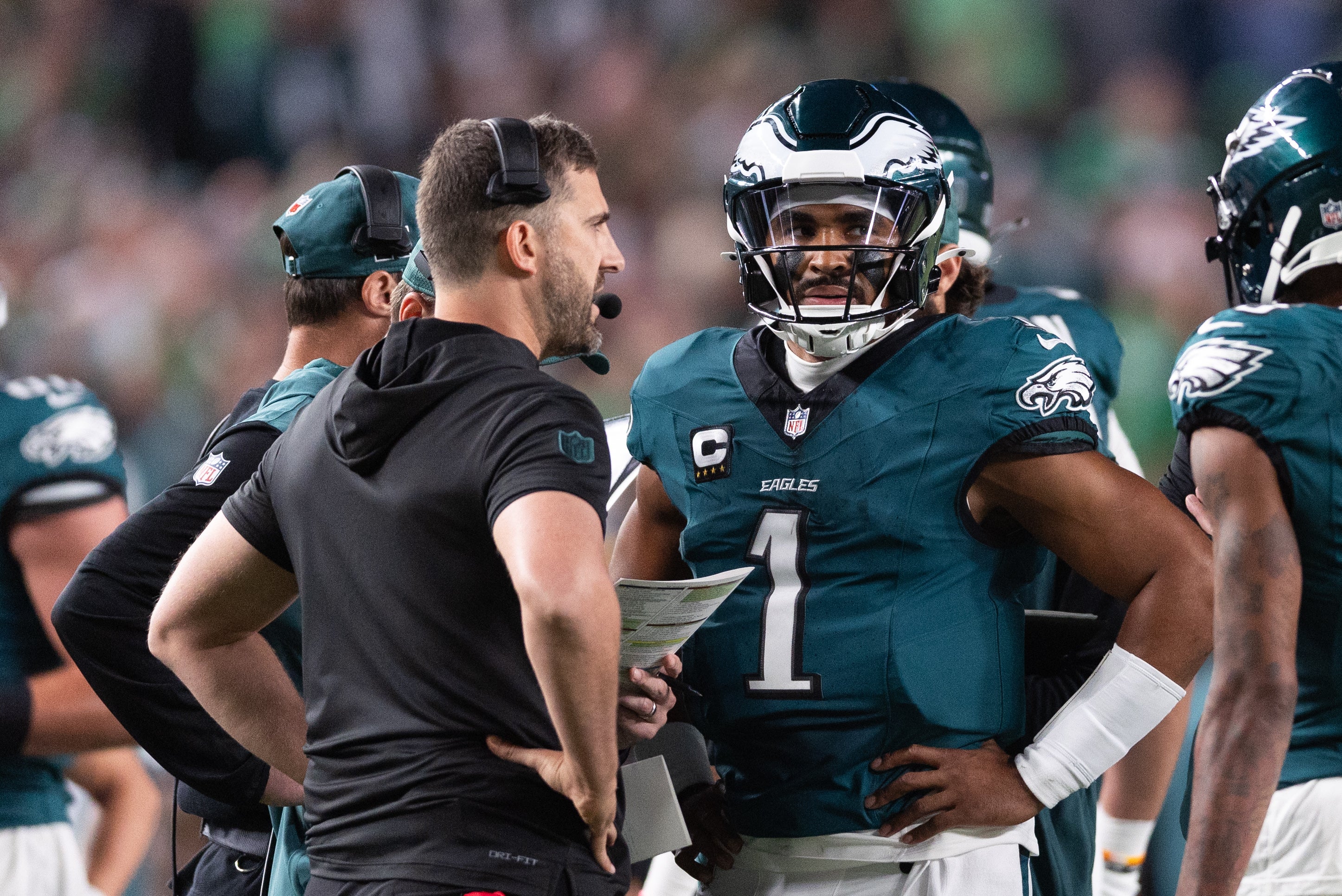Sep 16, 2024; Philadelphia, Pennsylvania, USA; Philadelphia Eagles quarterback Jalen Hurts (1) talks with head coach Nick Sirianni during a timeout in the first quarter against the Atlanta Falcons at Lincoln Financial Field.