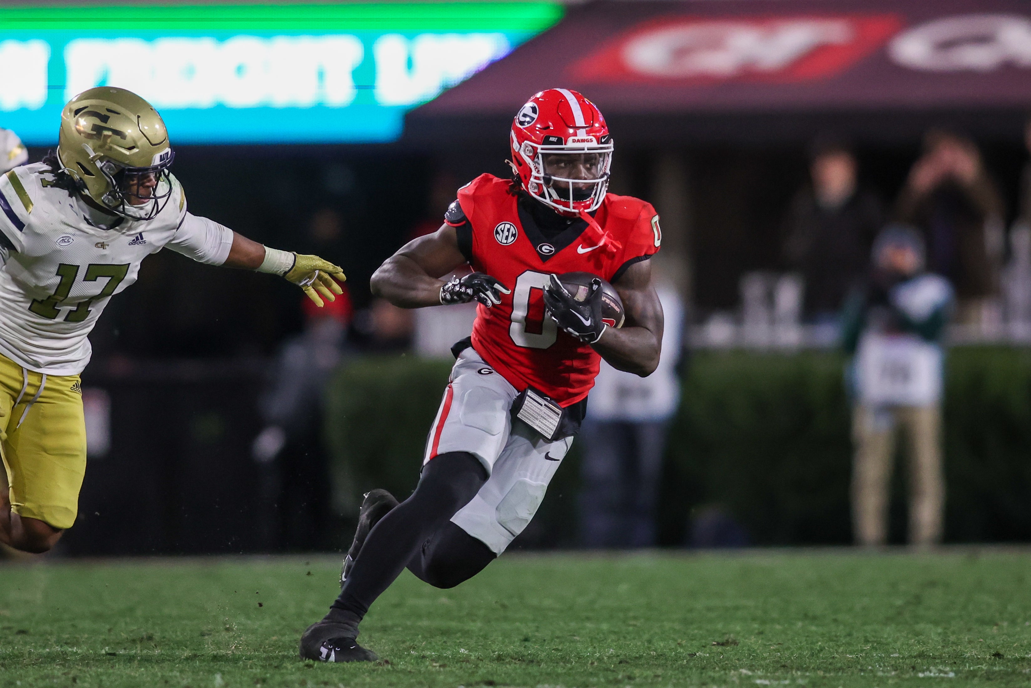 Georgia Bulldogs running back Roderick Robinson II (0) runs the ball against the Georgia Tech Yellow Jackets in the fourth quarter at Sanford Stadium.