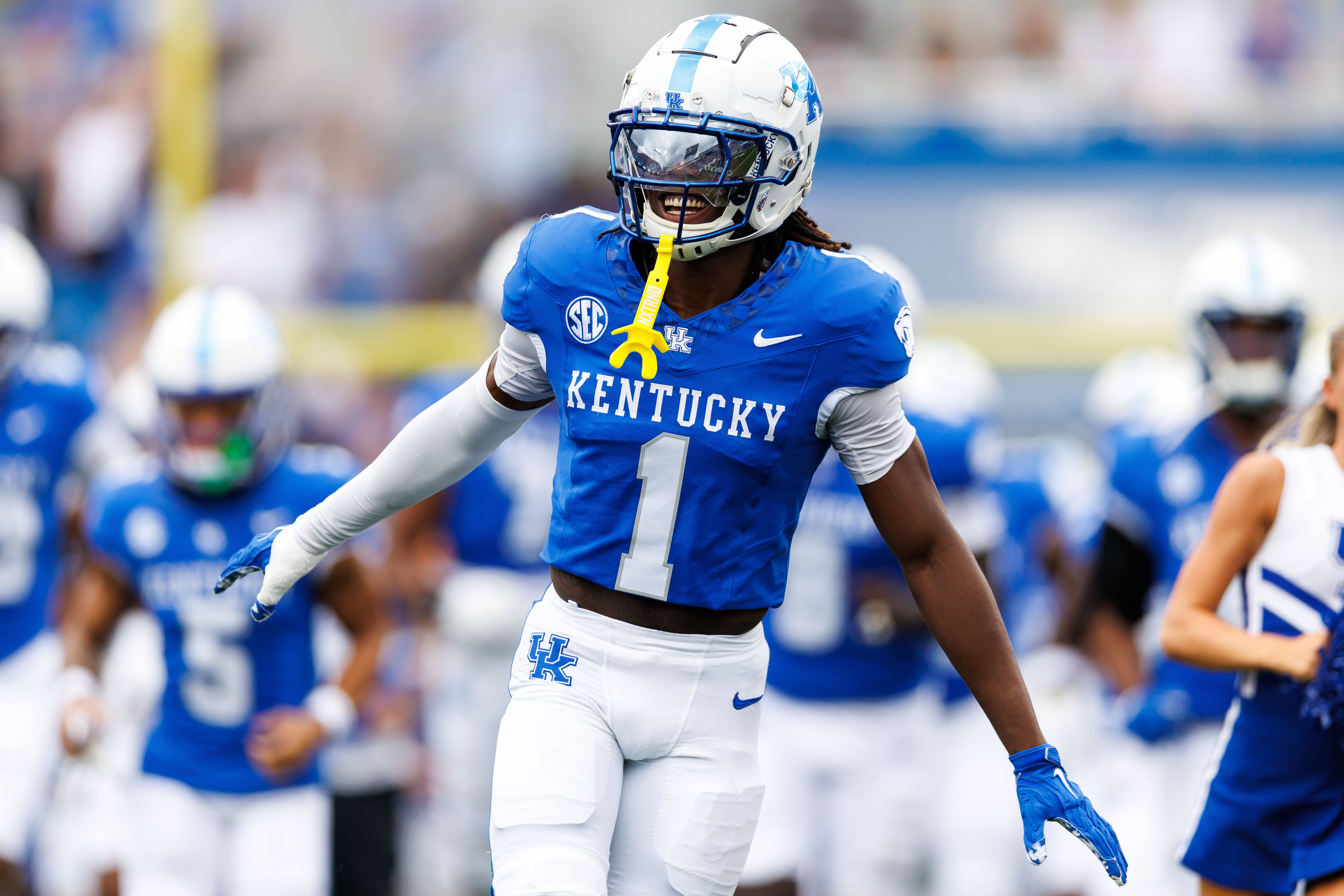Kentucky Wildcats defensive back Maxwell Hairston (1) runs onto the field before the game against the Ohio Bobcats at Kroger Field.
