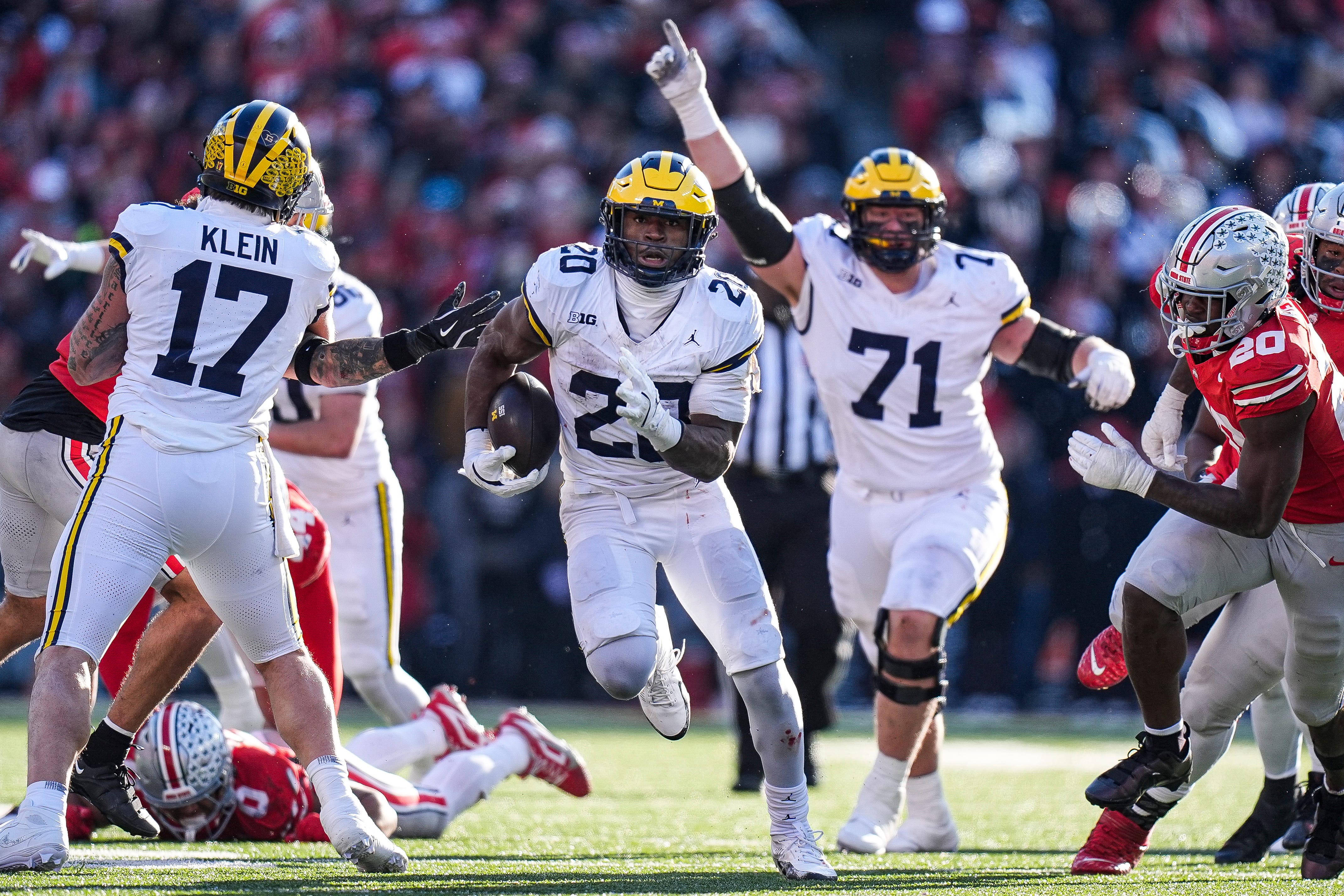 Michigan running back Kalel Mullings (20) runs against Ohio State during the second half at Ohio Stadium in Columbus, Ohio on Saturday, Nov. 30, 2024.