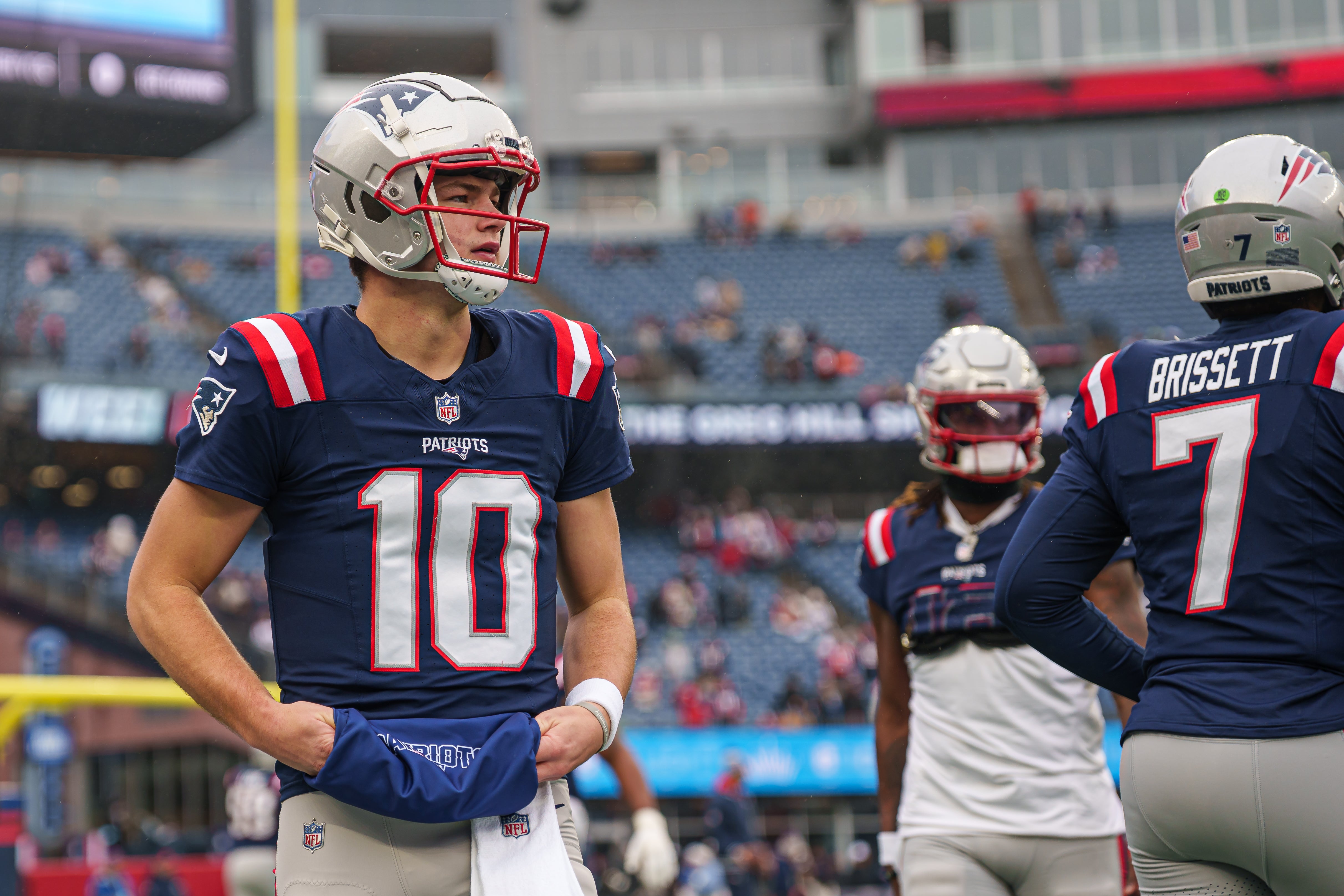 Dec 28, 2024; Foxborough, Massachusetts, USA; New England Patriots quarterback Drake Maye (10) warms up before the start of the game against the Los Angeles Chargers at Gillette Stadium.