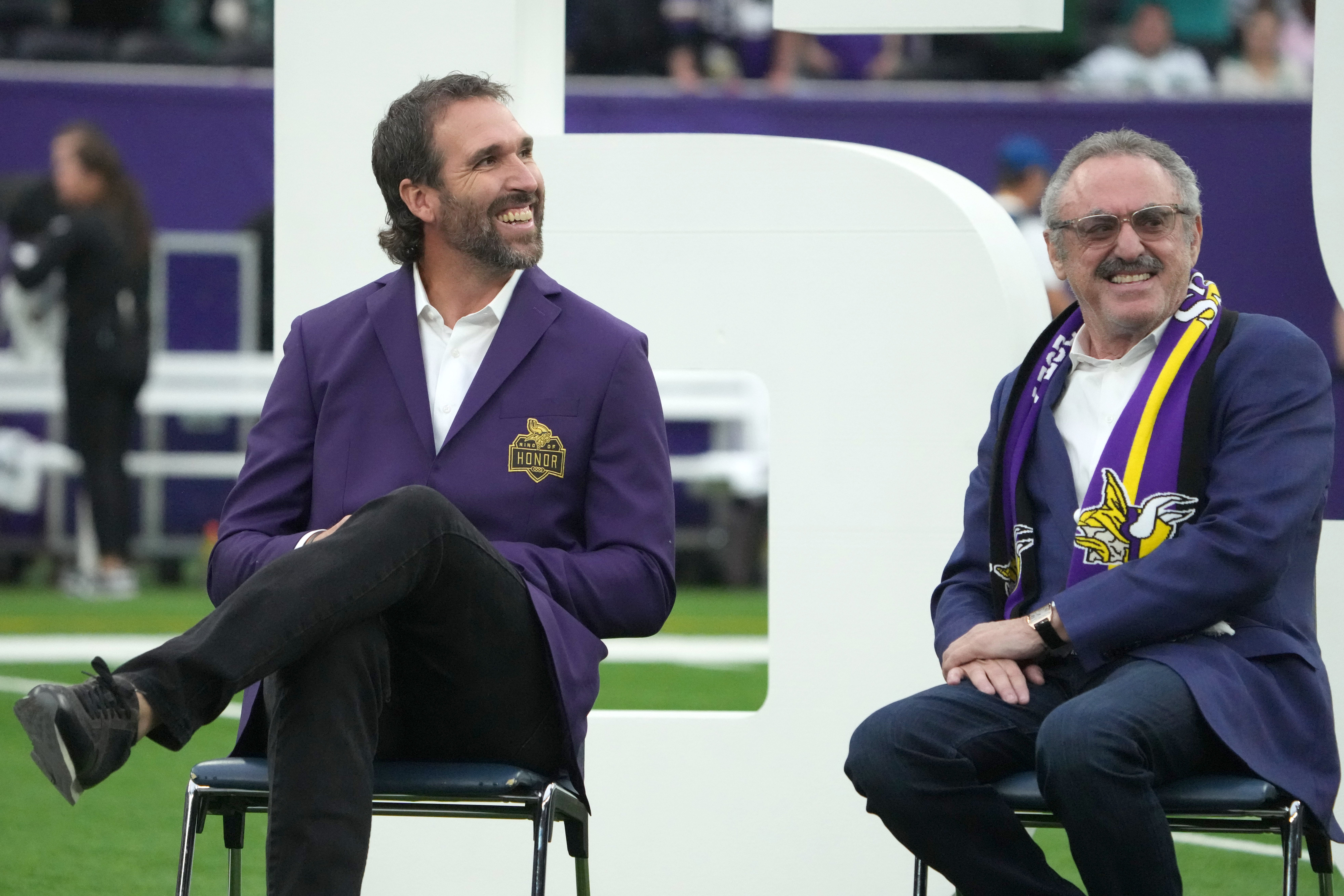 Oct 6, 2024; London, United Kingdom; Minnesota Vikings former defensive end Jared Allen shakes talks with Vikings owner Zygi Wilf during the 2024 NFL London Games Ring of Honour ceremony at Tottenham Hotspur Stadium.