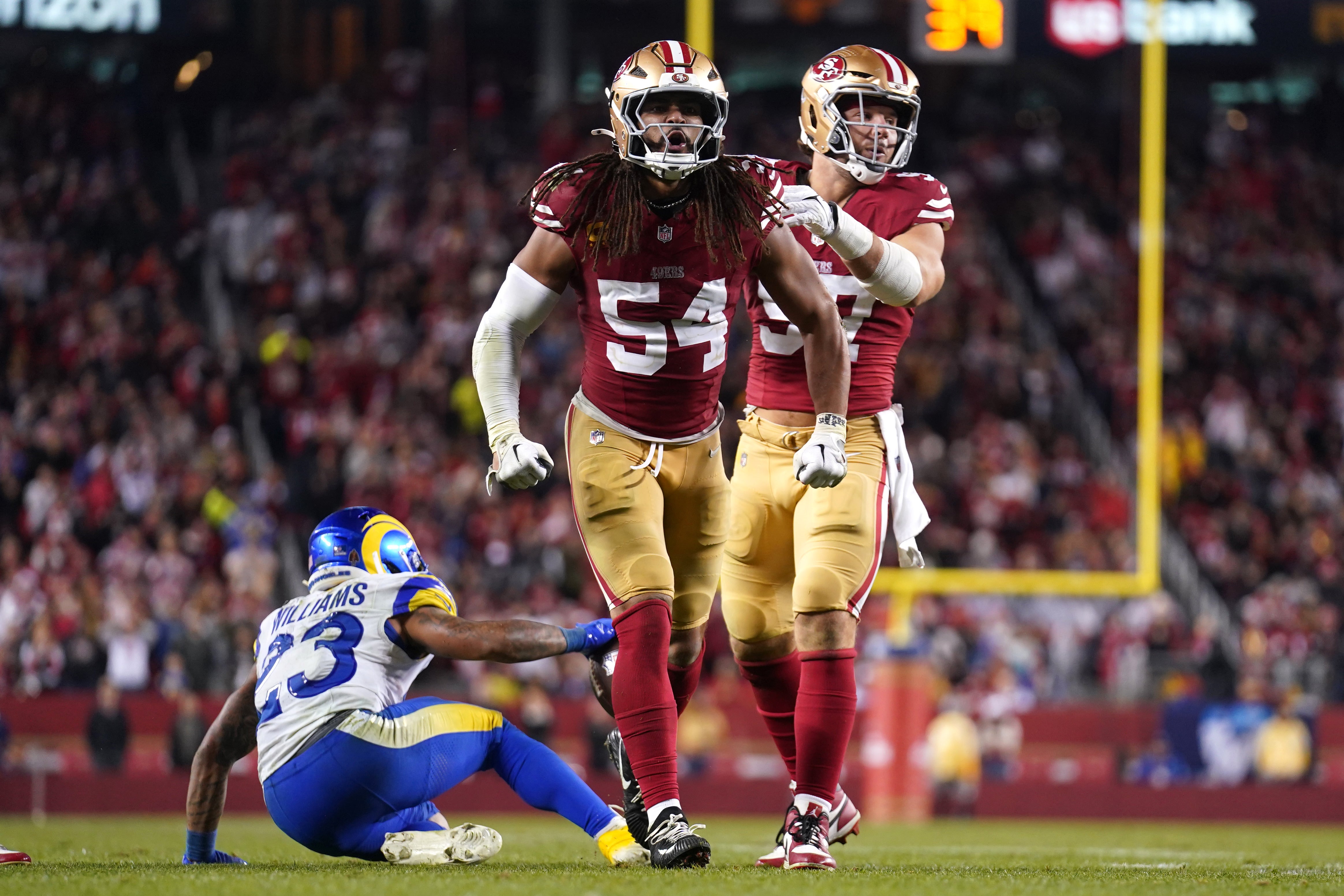 San Francisco 49ers linebacker Fred Warner (54) reacts after making a tackle against the Los Angeles Rams in the fourth quarter at Levi's Stadium.