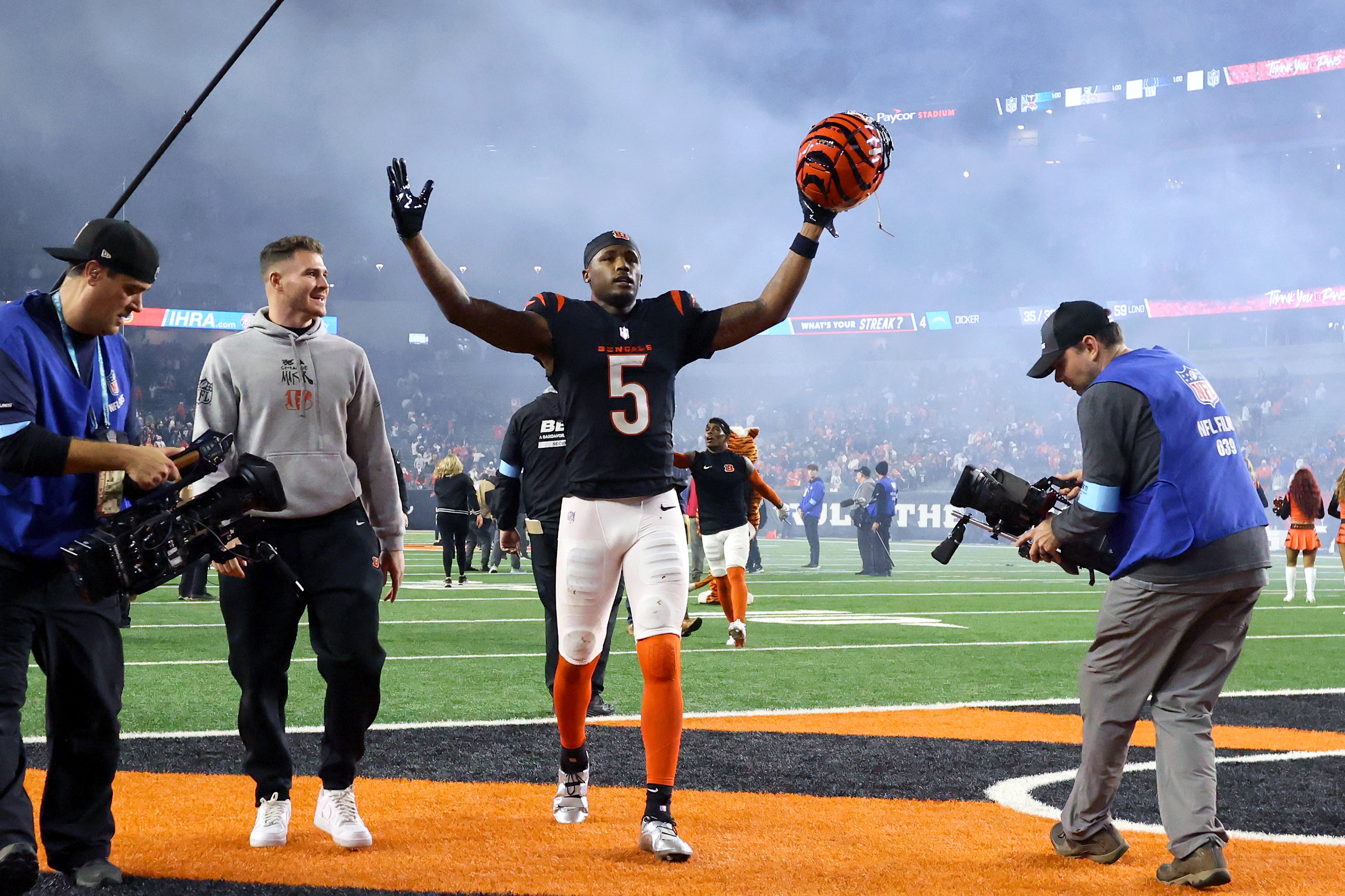 Dec 28, 2024; Cincinnati, Ohio, USA; Cincinnati Bengals wide receiver Tee Higgins (5) celebrates following the overtime win against the Denver Broncos at Paycor Stadium.
