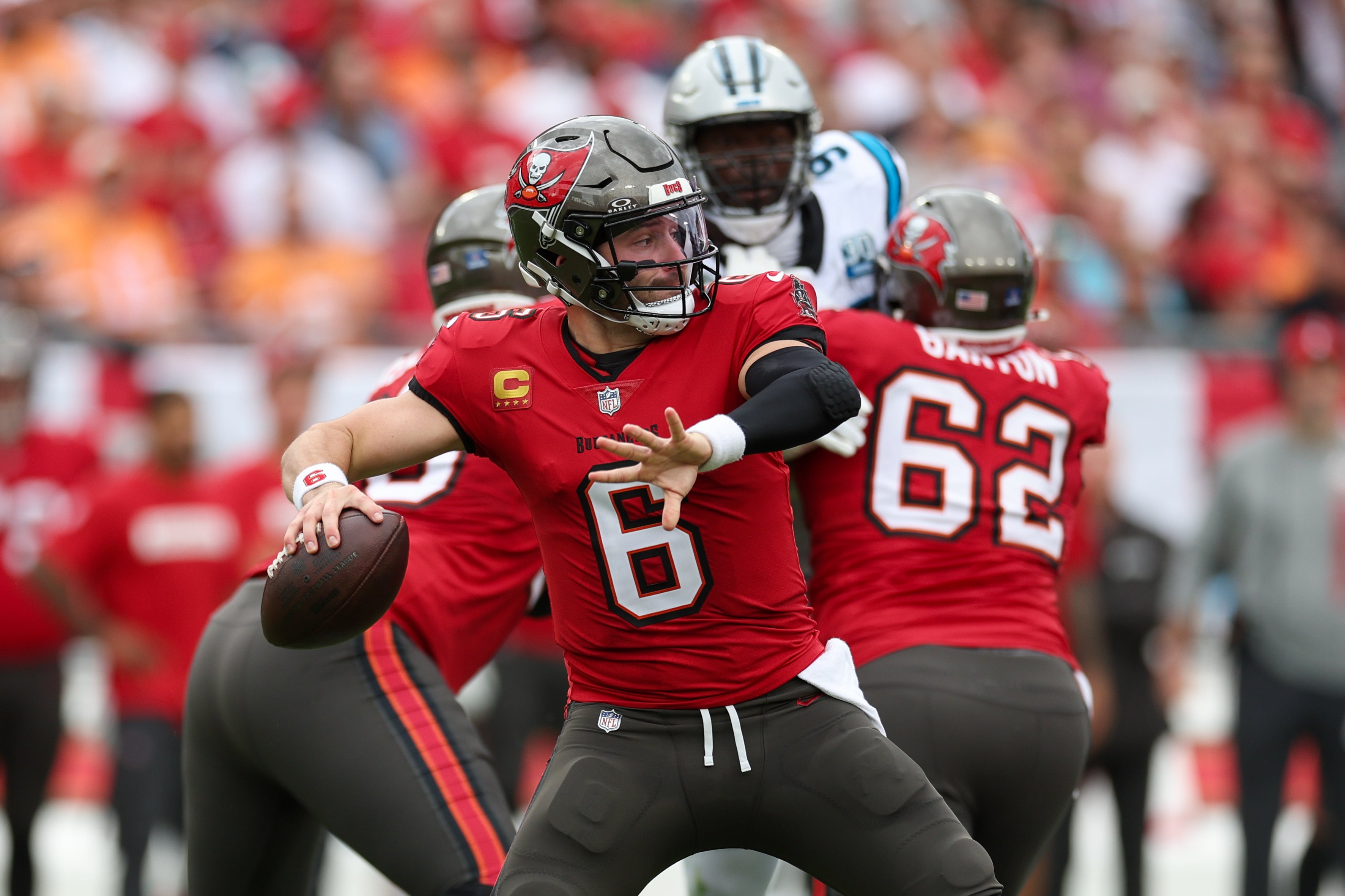 Dec 29, 2024; Tampa, Florida, USA; Tampa Bay Buccaneers quarterback Baker Mayfield (6) drops back to pass against the Carolina Panthers in the first quarter at Raymond James Stadium.
