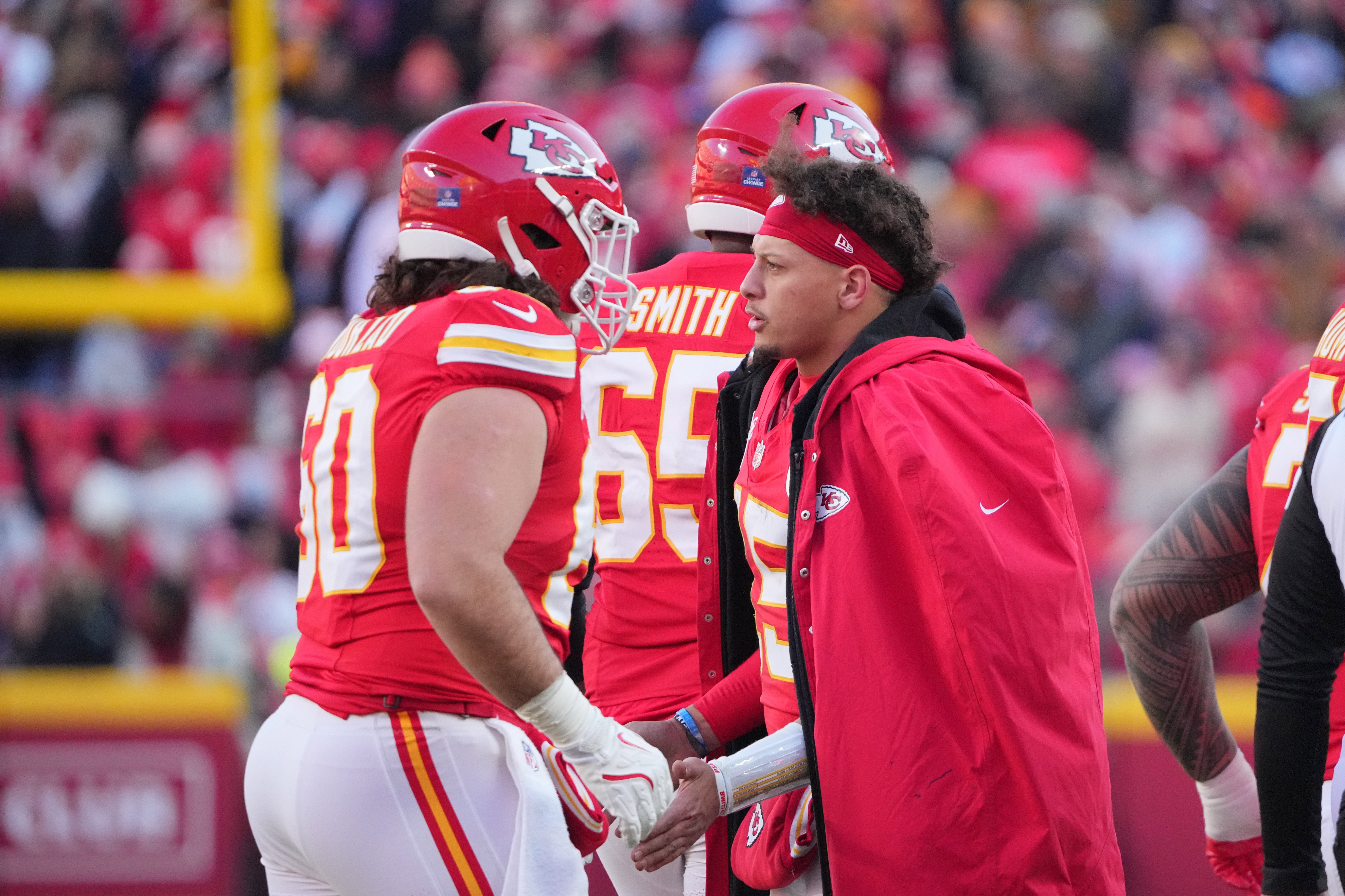 Dec 21, 2024; Kansas City, Missouri, USA; Kansas City Chiefs quarterback Patrick Mahomes (15) congratulate players after a score against the Houston Texans during the second half at GEHA Field at Arrowhead Stadium.