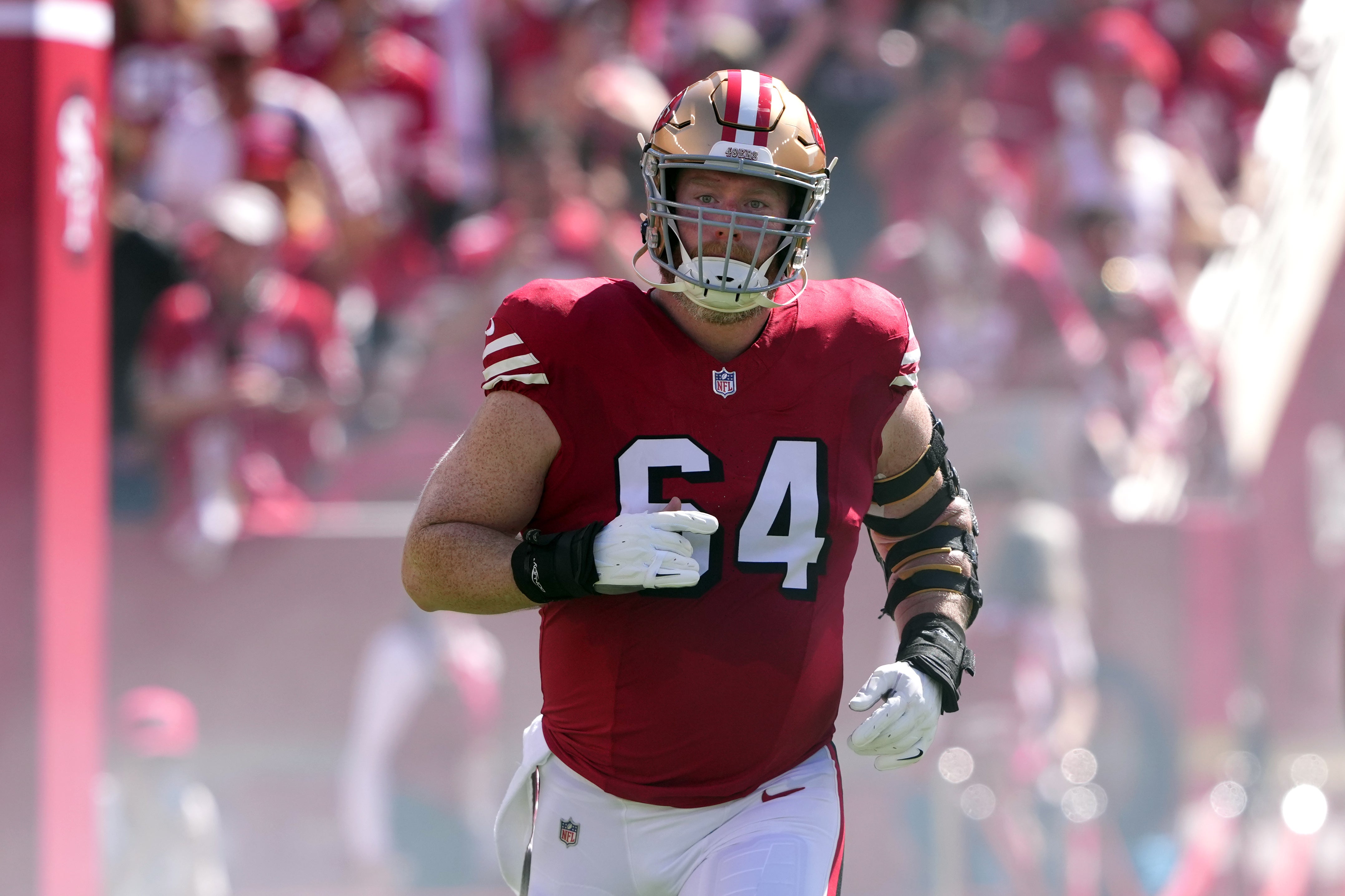 San Francisco 49ers center Jake Brendel (64) is introduced before the game against the Arizona Cardinals at Levi's Stadium.