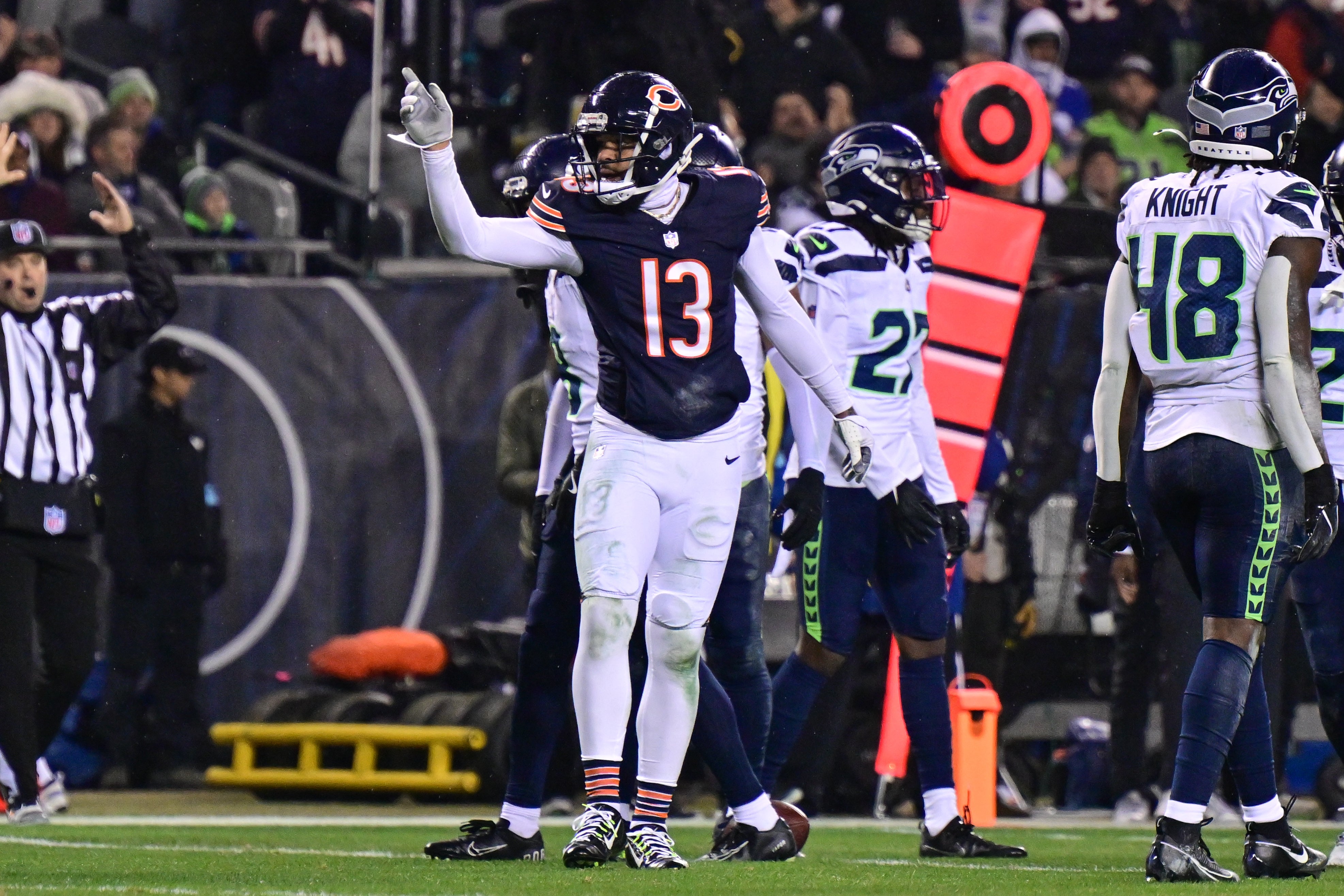 Dec 26, 2024; Chicago, Illinois, USA; Chicago Bears wide receiver Keenan Allen (13) signals first down after a catch against the Seattle Seahawks during the second quarter at Soldier Field.