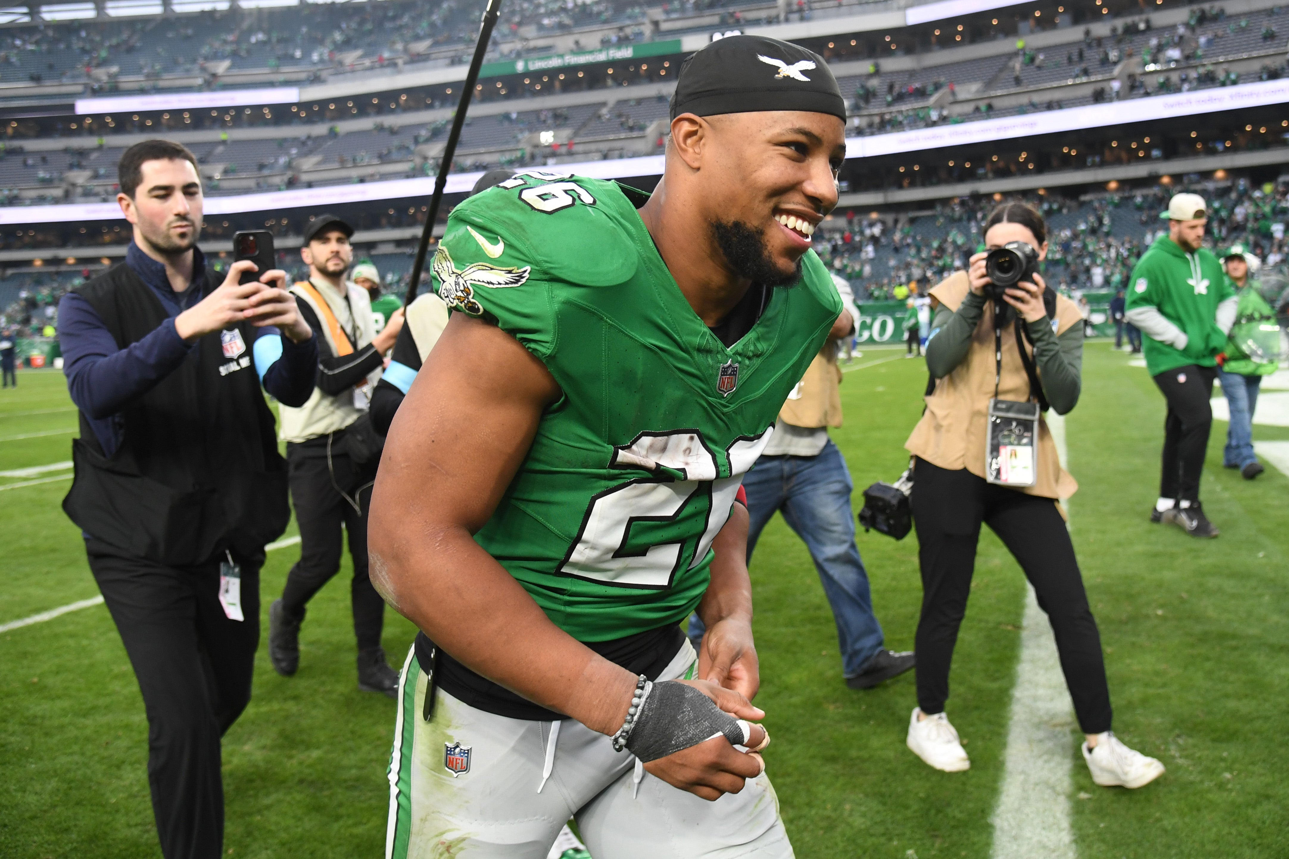 Philadelphia Eagles running back Saquon Barkley (26) runs off the field after win against the Dallas Cowboys at Lincoln Financial Field.