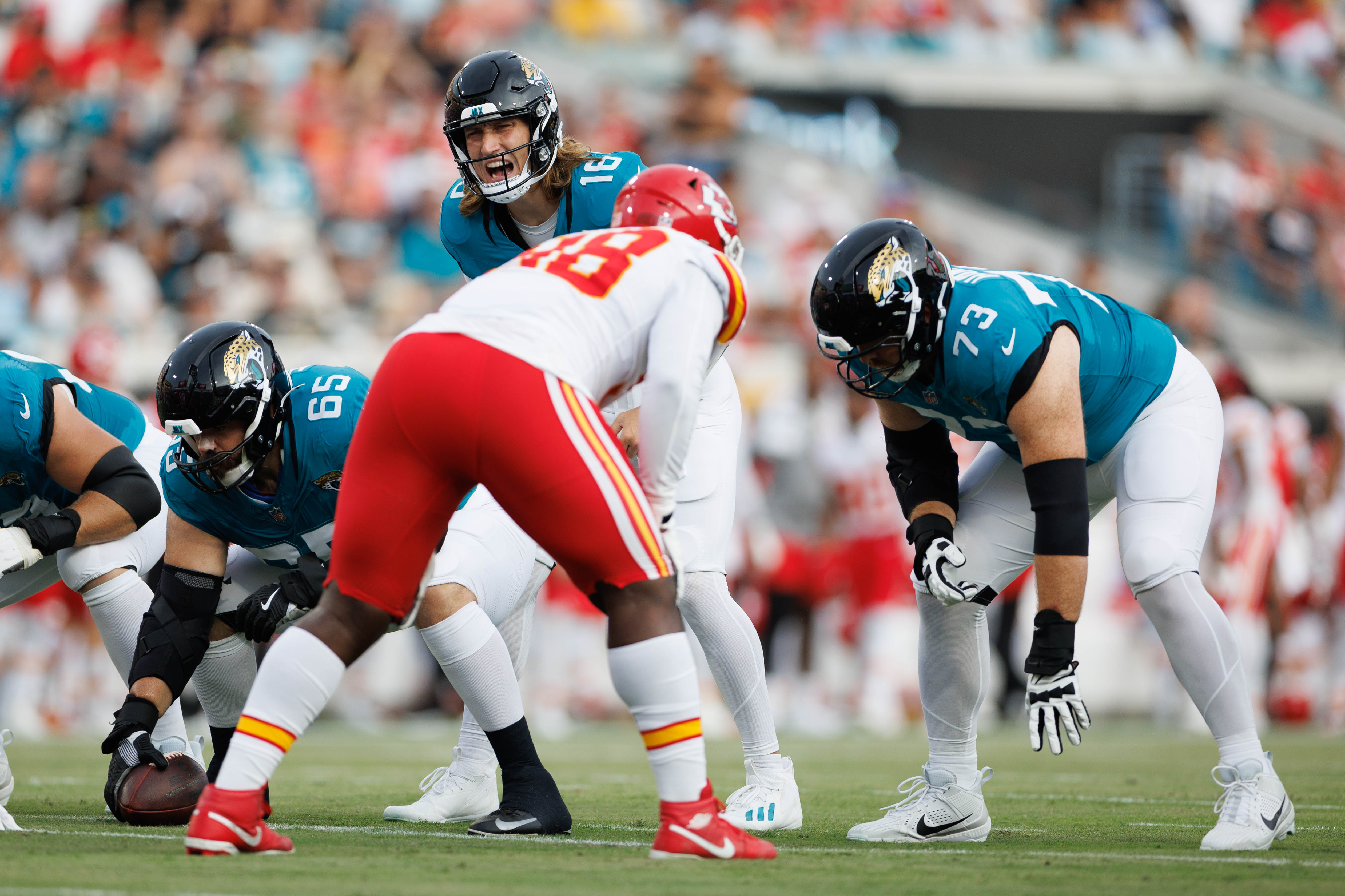 Jaguars quarterback Trevor Lawrence (16) calls an audible during the first quarter against the Chiefs