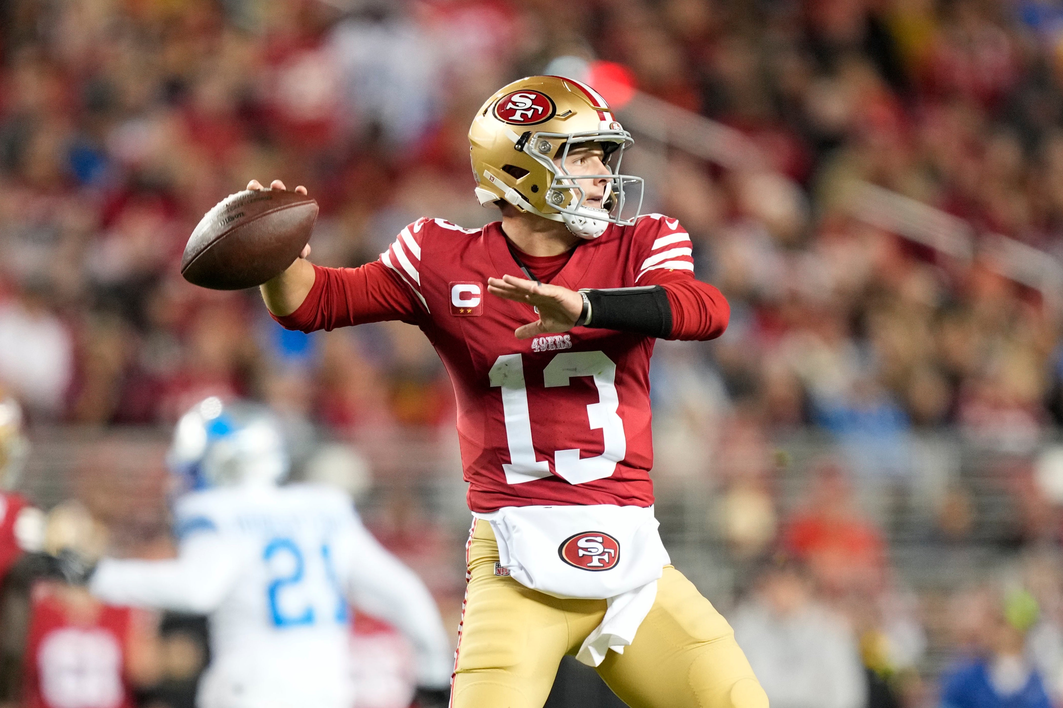 San Francisco 49ers quarterback Brock Purdy (13) passes the football against the Detroit Lions during the first quarter at Levi's Stadium.