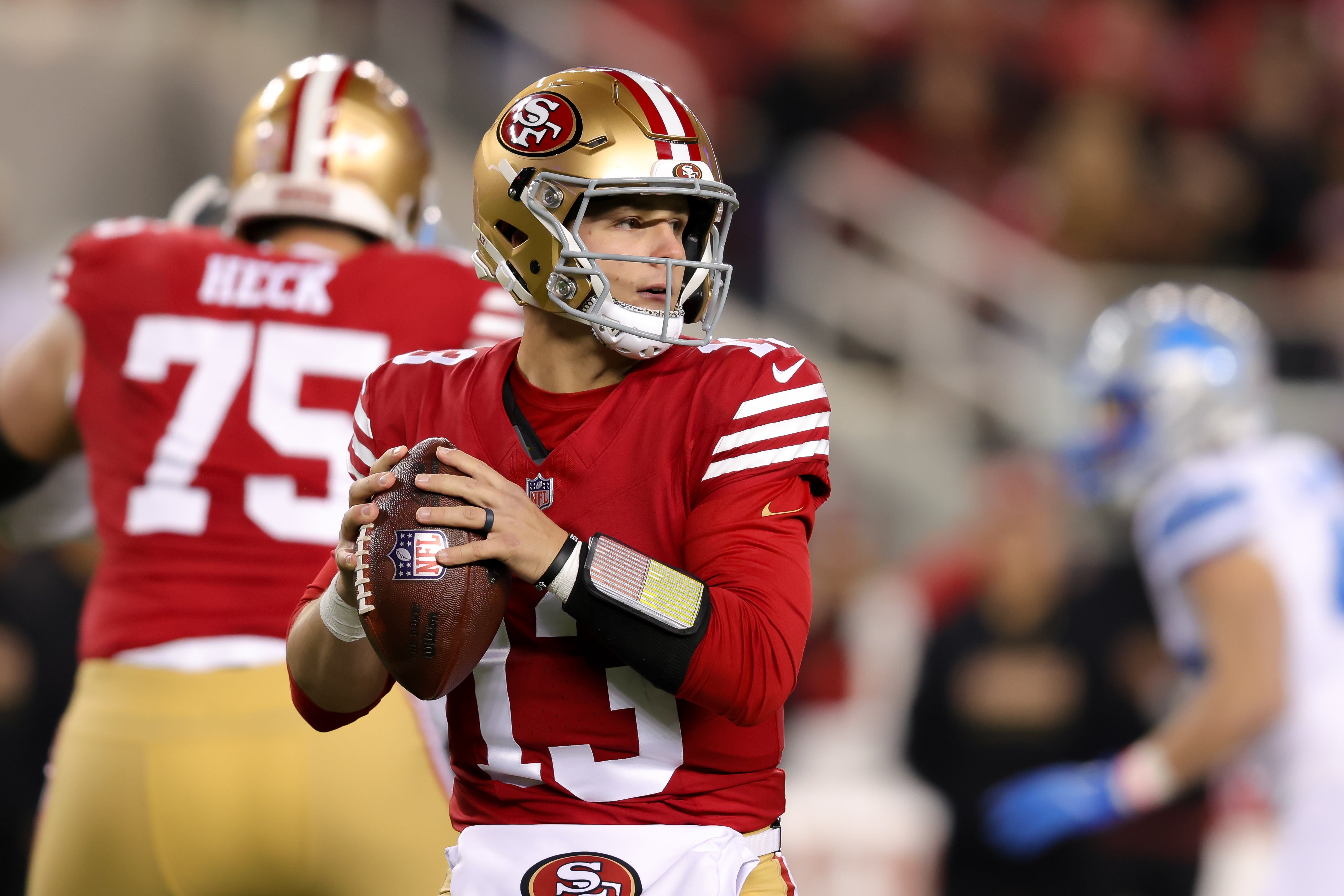 San Francisco 49ers quarterback Brock Purdy (13) drops back to pass during the first quarter against the Detroit Lions at Levi's Stadium.