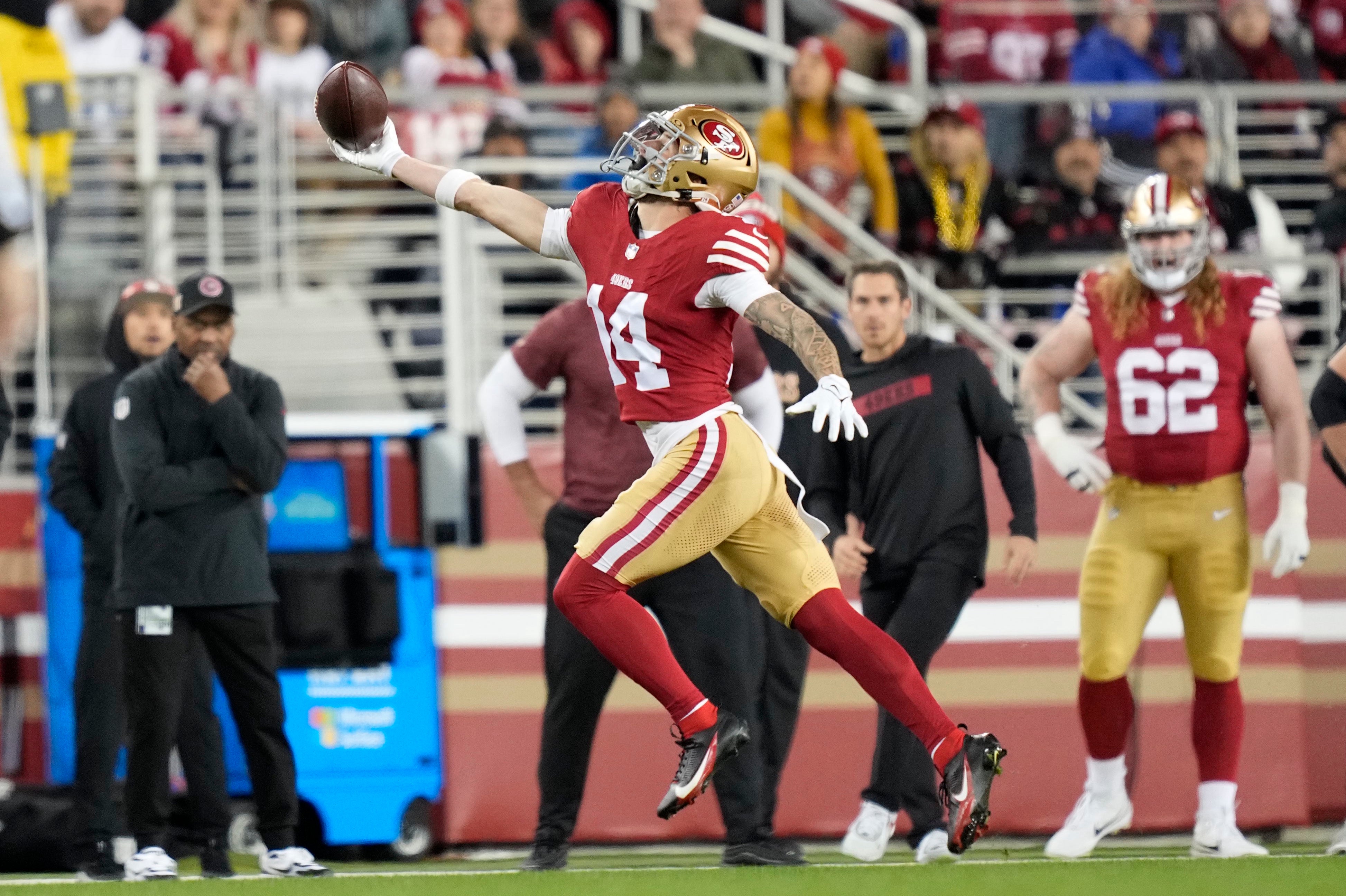 San Francisco 49ers wide receiver Ricky Pearsall (14) catches the football against the Detroit Lions during the first quarter at Levi's Stadium.