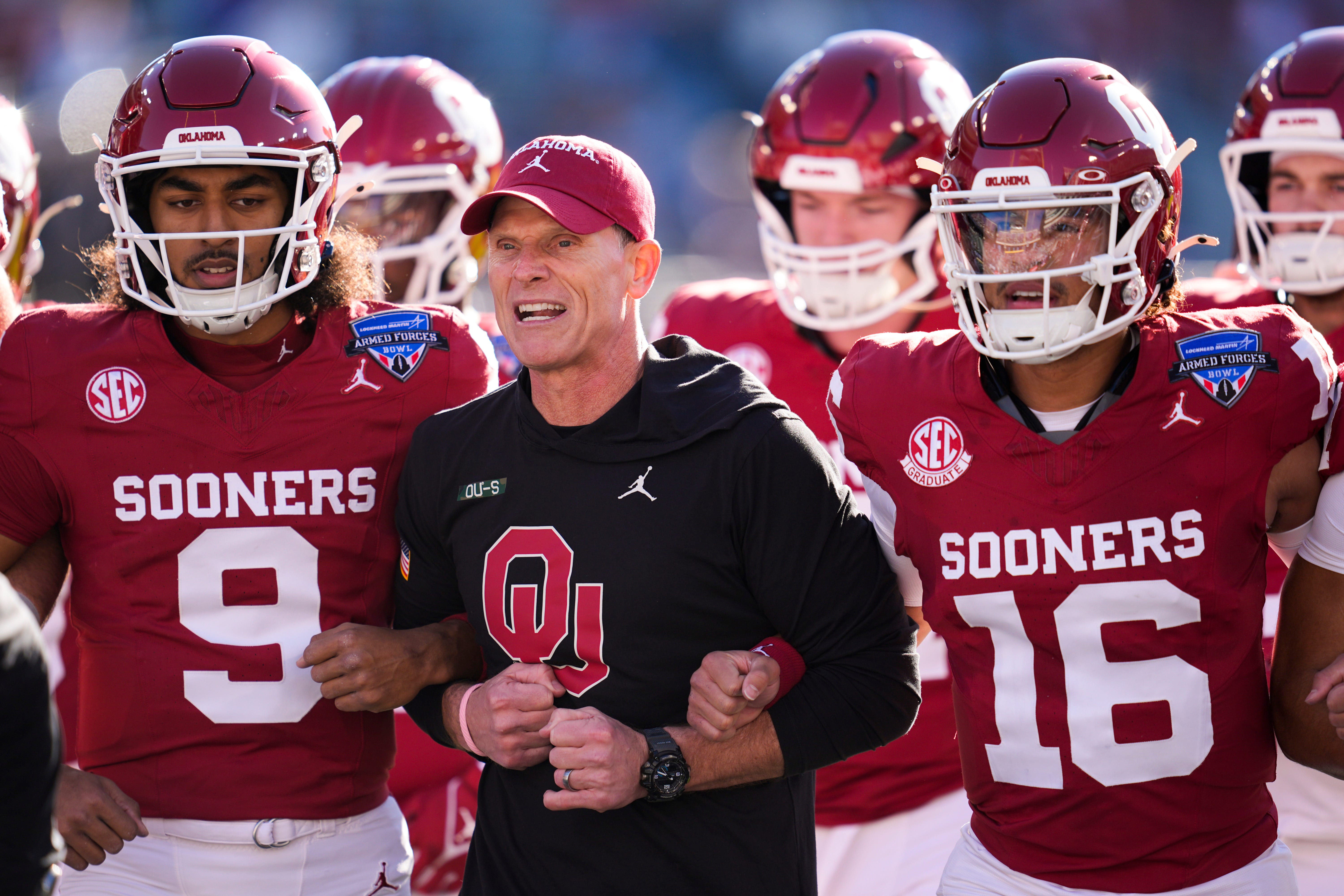 Oklahoma Sooners head coach Brent Venables and quarterback Michael Hawkins