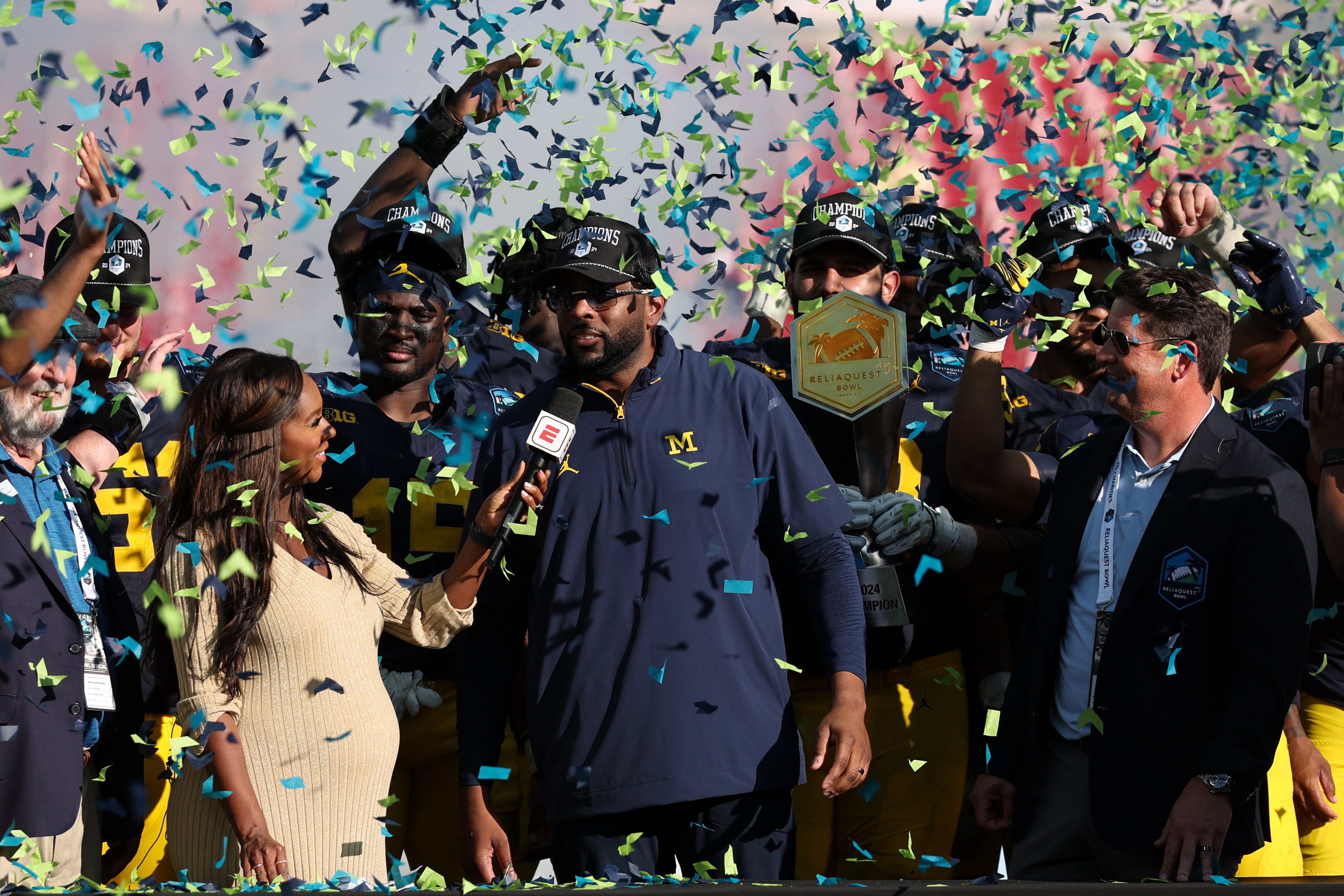 Dec 31, 2024; Tampa, FL, USA; Michigan Wolverines head coach Sherrone Moore celebrates after beating the Alabama Crimson Tide in the ReliaQuest Bowl at Raymond James Stadium.