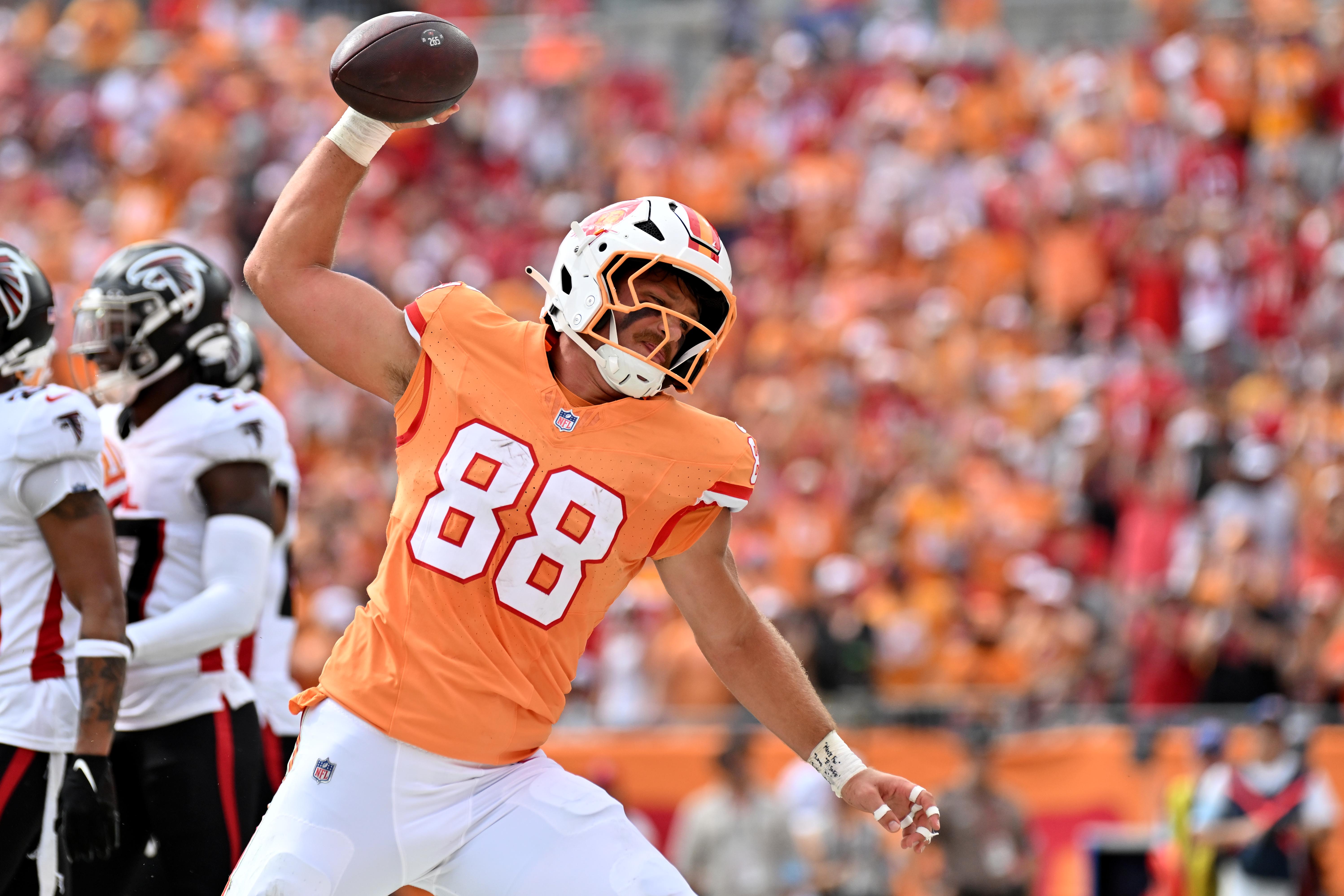 Oct 27, 2024; Tampa, Florida, USA; Tampa Bay Buccaneers tight end Cade Otton (88) spikes the ball after scoring a touchdown in the first half against the Atlanta Falcons at Raymond James Stadium.