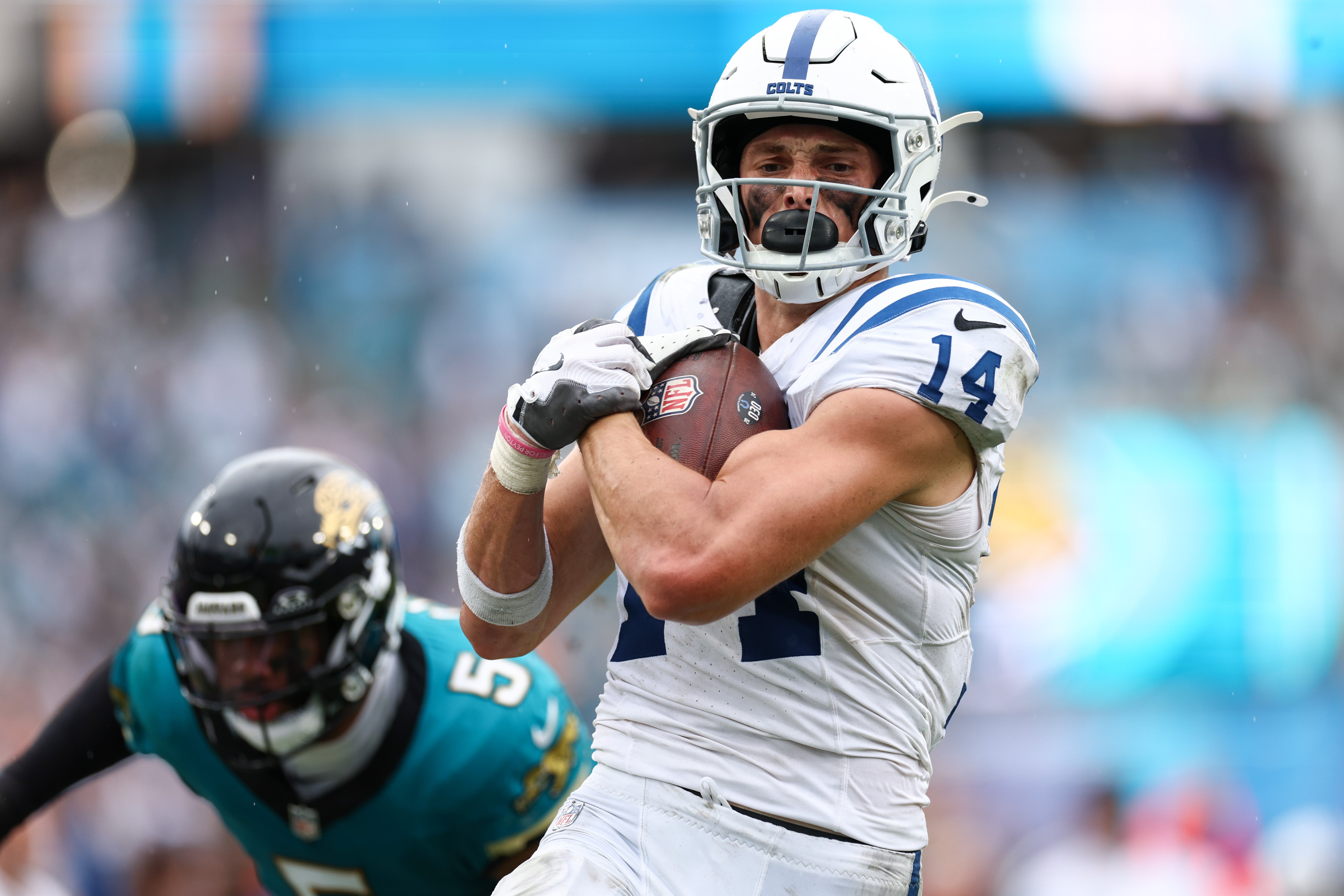 Oct 6, 2024; Jacksonville, Florida, USA; Indianapolis Colts wide receiver Alec Pierce (14) scores a touchdown against the Jacksonville Jaguars in the fourth quarter at EverBank Stadium.