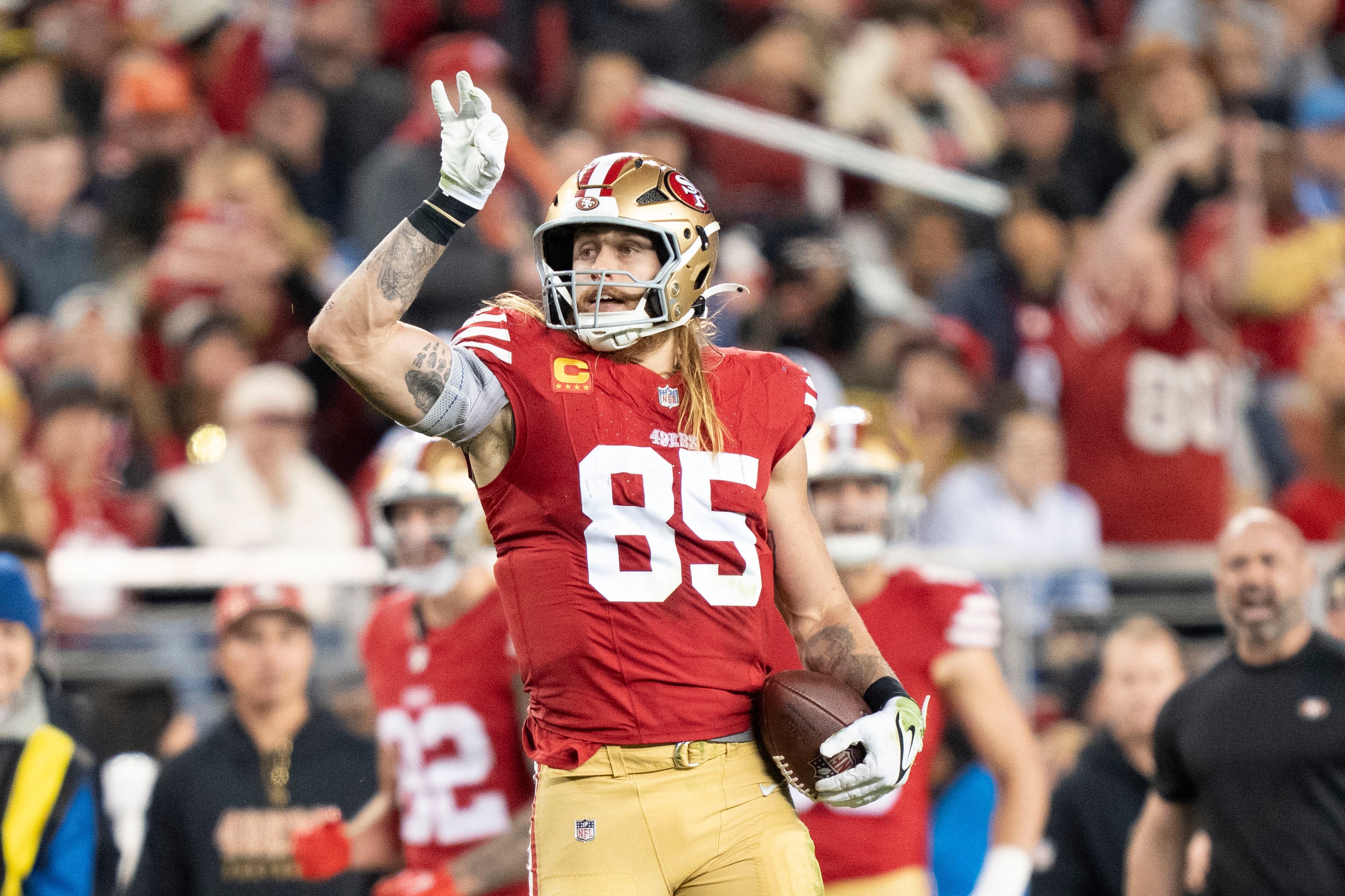 San Francisco 49ers tight end George Kittle (85) celebrates a first down against the Detroit Lions during the fourth quarter at Levi's Stadium.