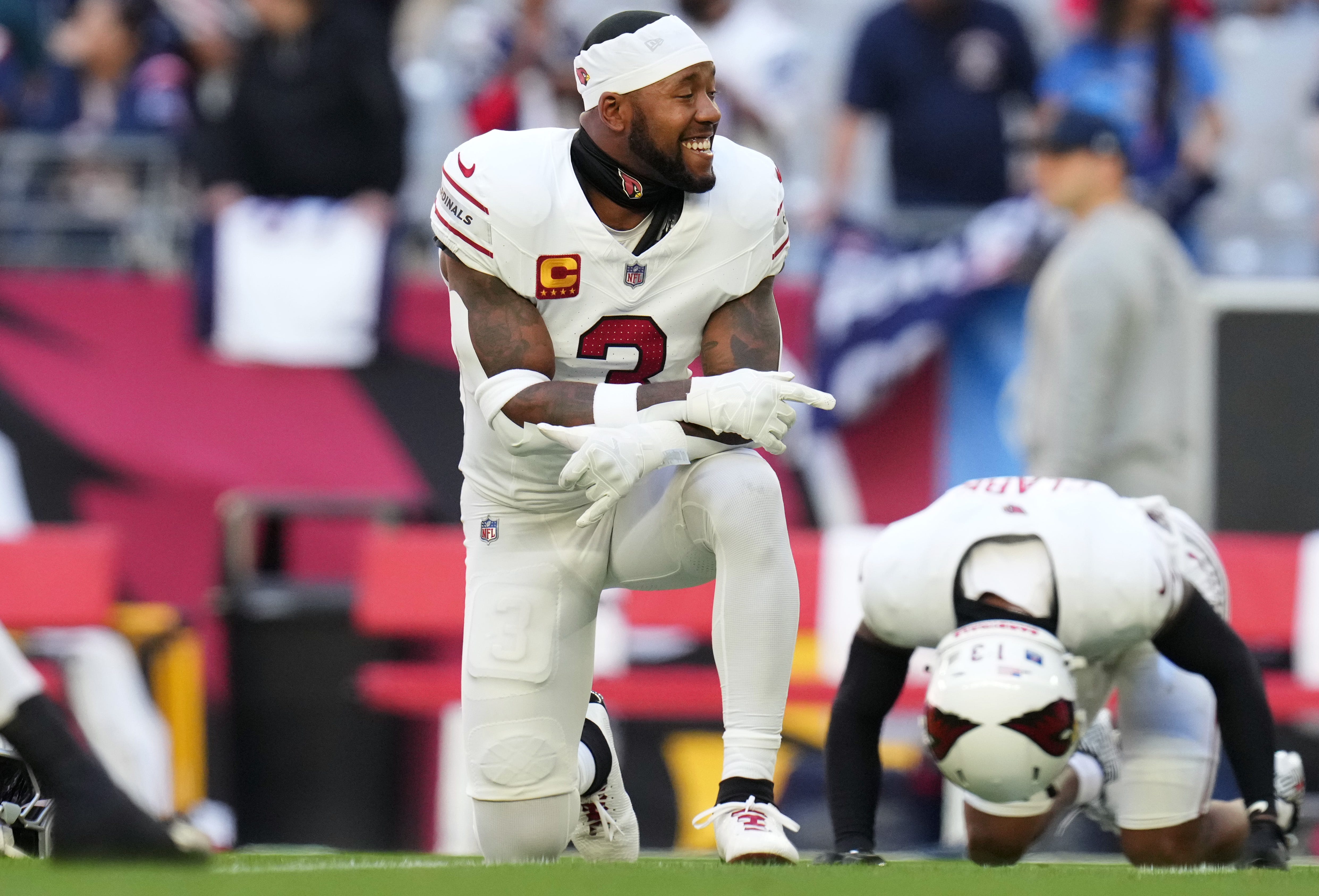 Arizona Cardinals safety Budda Baker (3) stretches before they play the New England Patriots at State Farm Stadium on Dec. 15, 2024.