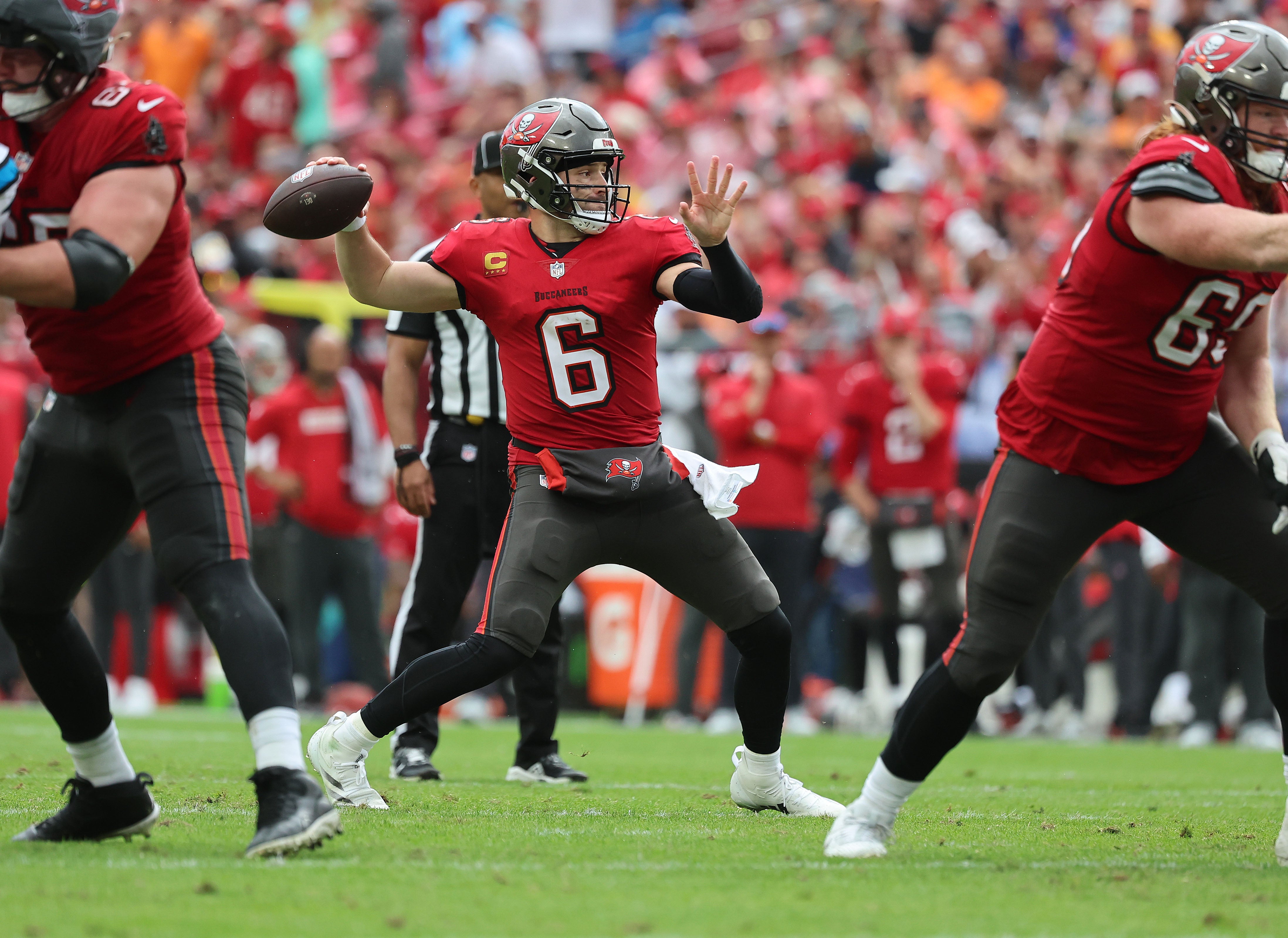 Dec 29, 2024; Tampa, Florida, USA; Tampa Bay Buccaneers quarterback Baker Mayfield (6) throws the ball against the Carolina Panthers during the second half at Raymond James Stadium.