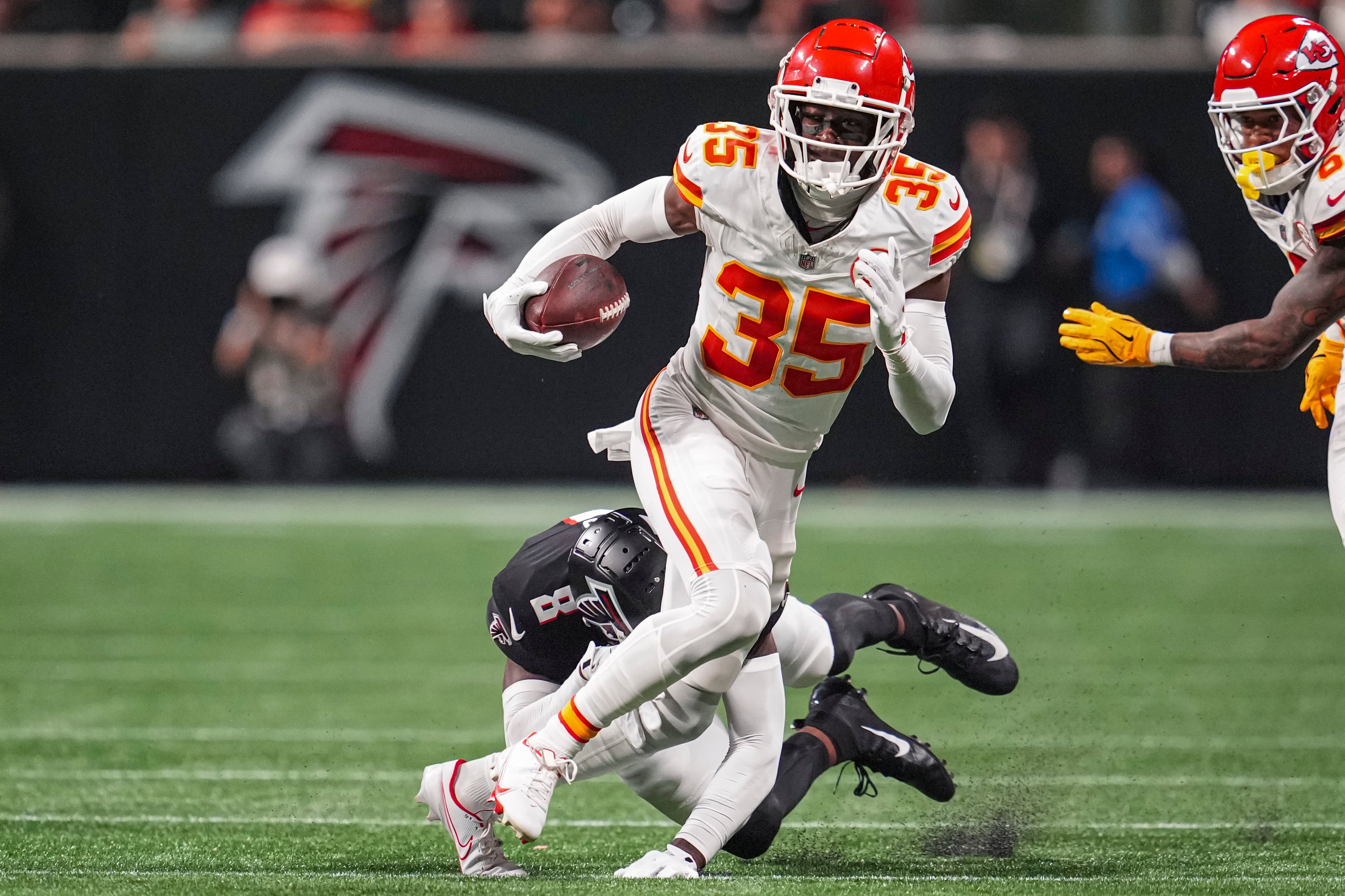 Sep 22, 2024; Atlanta, Georgia, USA; Kansas City Chiefs cornerback Jaylen Watson (35) runs after taking a lateral after an interception against the Atlanta Falcons during the second half at Mercedes-Benz Stadium.