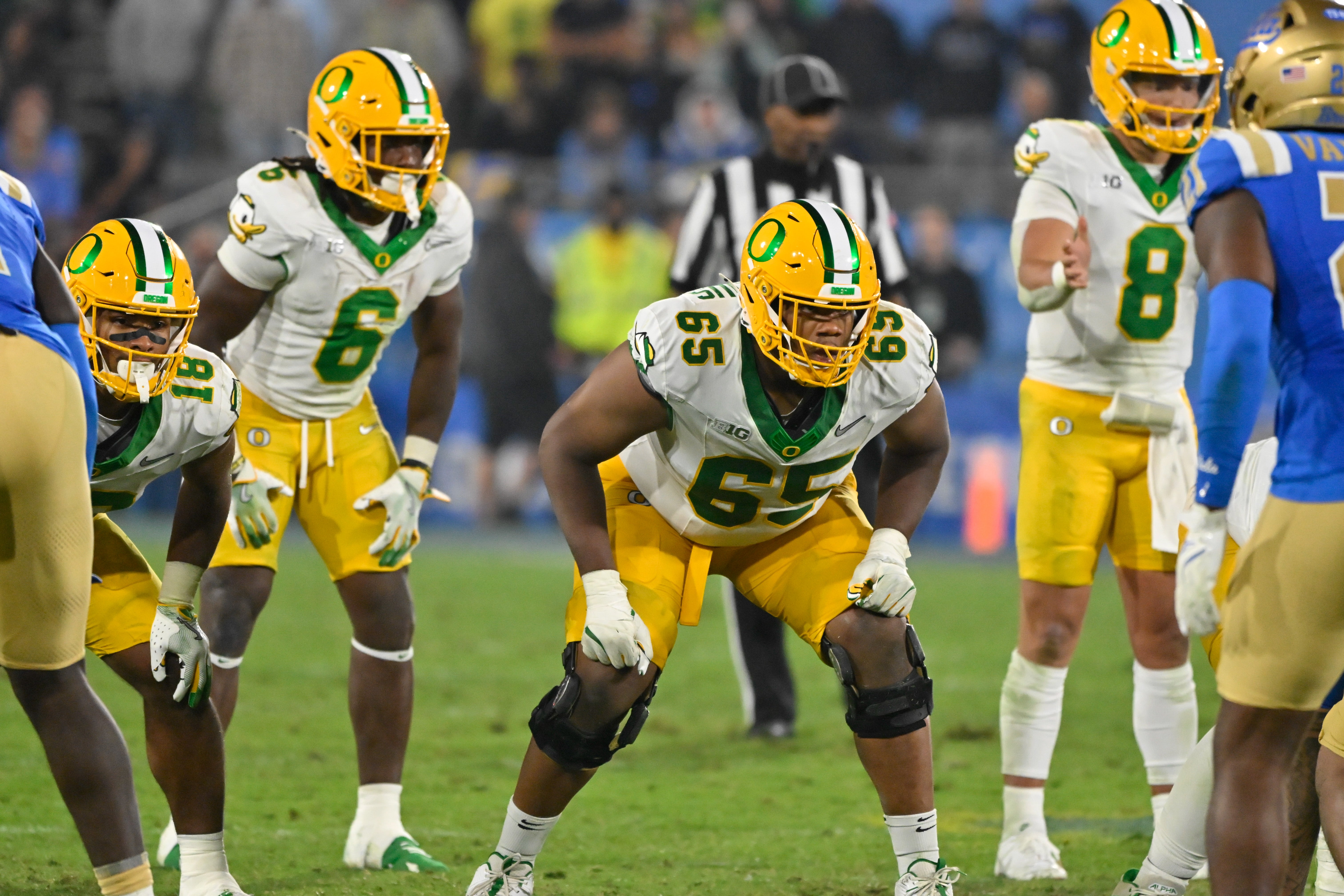 Sep 28, 2024; Pasadena, California, USA; Oregon Ducks offensive lineman Ajani Cornelius (65) during the third quarter against the UCLA Bruins at the Rose Bowl.