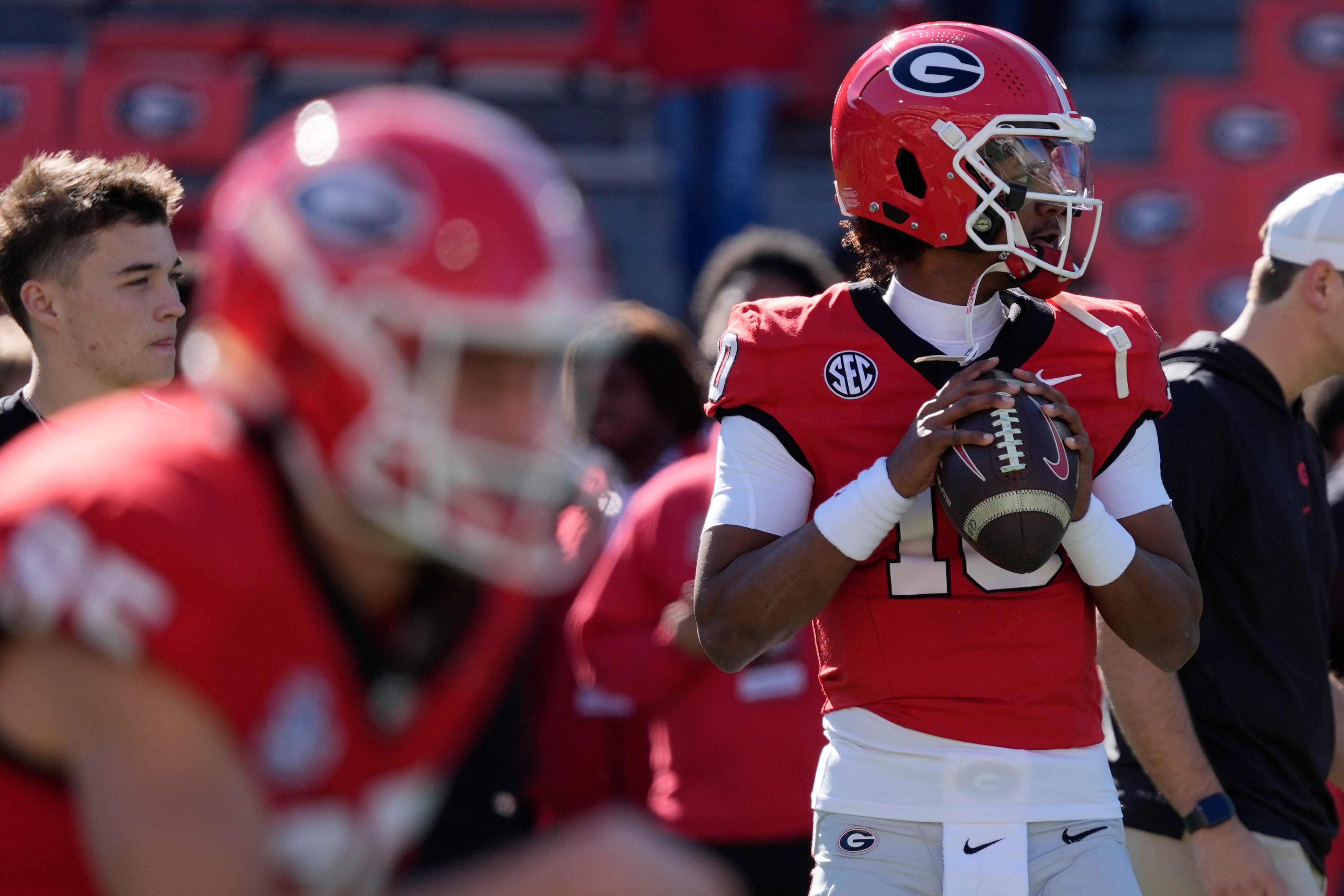 Georgia quarterback Jaden Rashada (10) warms up before the start of a NCAA college football game against Massachusetts in Athens, Ga., on Saturday, Nov. 23, 2024.