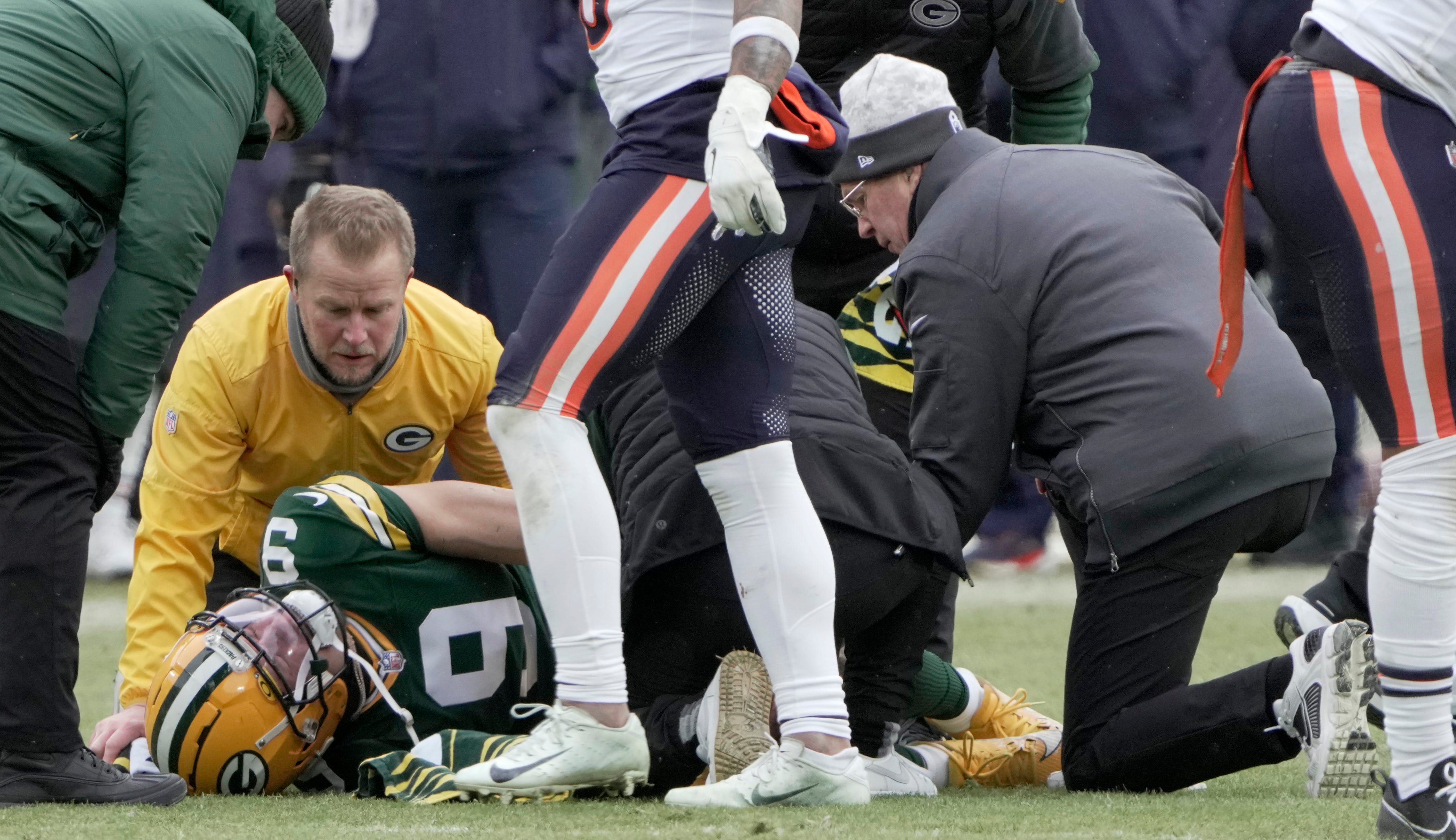 Green Bay Packers wide receiver Christian Watson (9) is ended to after being injured during the first quarter of their game Sunday, January 5, 2025 at Lambeau Field in Green Bay, Wisconsin. The Chicago Bears beat the Green Bay Packers 24-22.