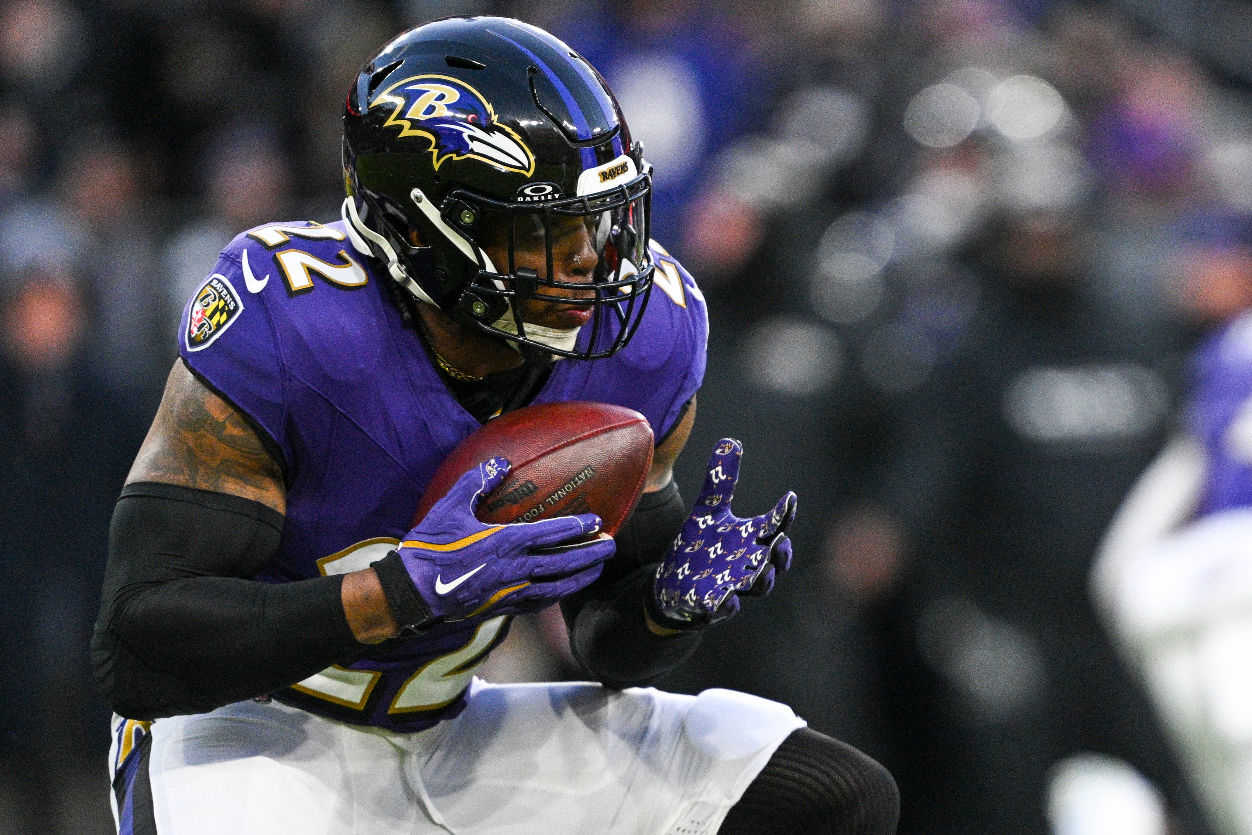 Jan 4, 2025; Baltimore, Maryland, USA; Baltimore Ravens running back Derrick Henry (22) runs with the ball during the first quarter against the Cleveland Browns at M&T Bank Stadium. Mandatory Credit: Tommy Gilligan-Imagn Images